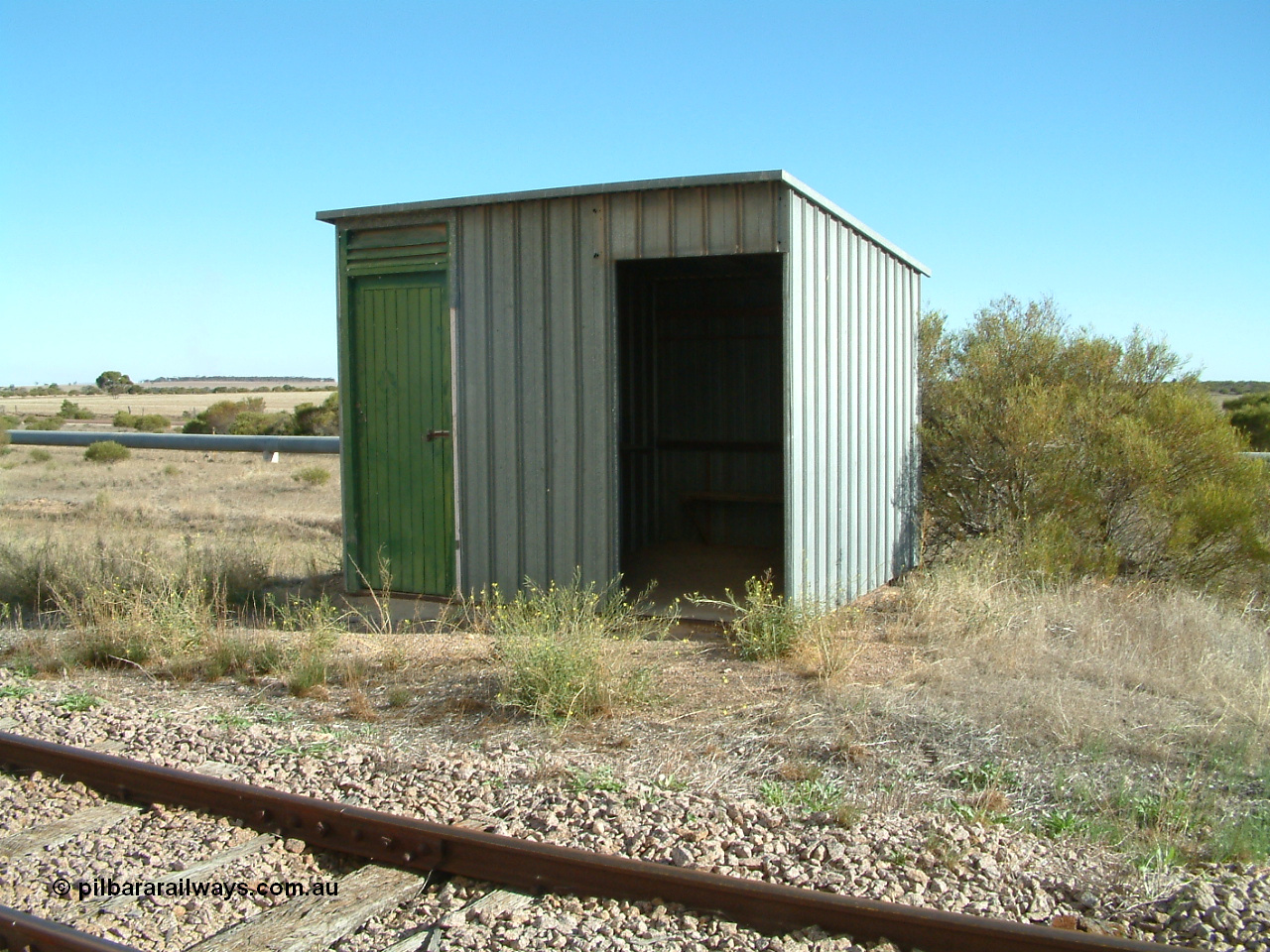 030411 160432
Cungena located at , opened 3rd July 1916, station building shelter shed missing name-board.
