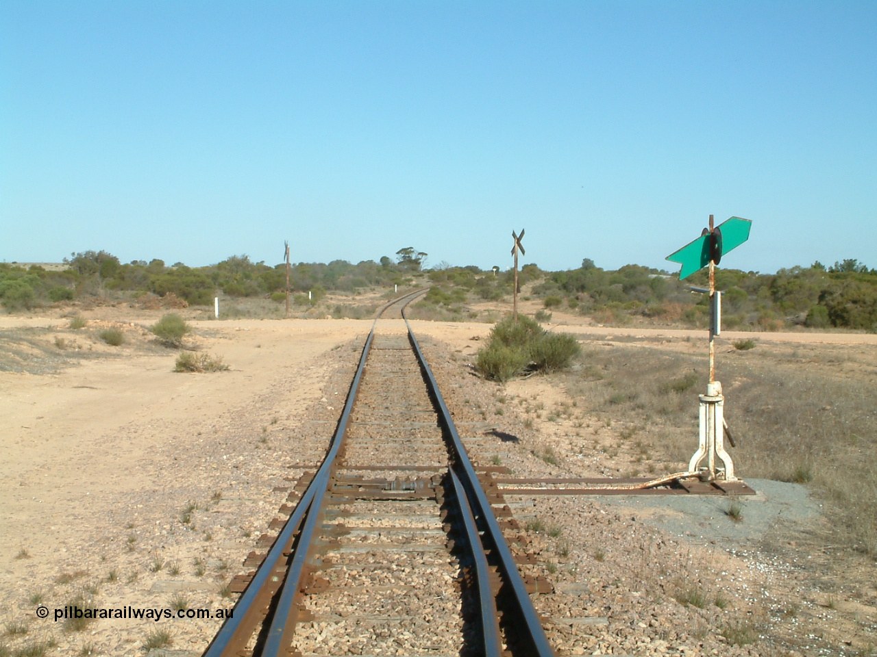030411 160716
Cungena, looking south at Port Lincoln end of yard across stop sign protected grade crossing for Dickson Drive.
