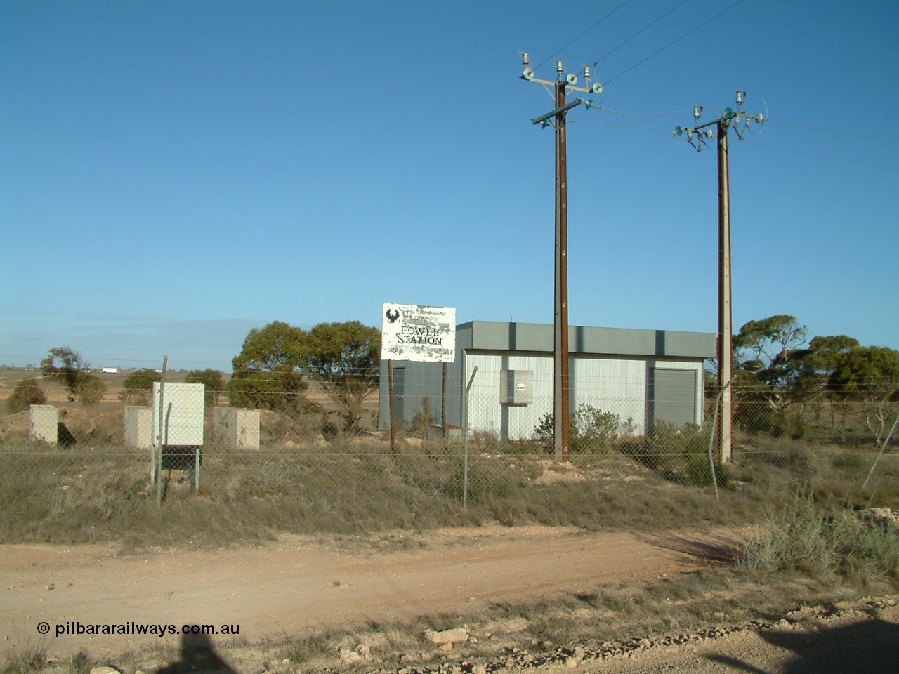 030414 165816
Penong, former power station, couple of Stobie poles out the front.
