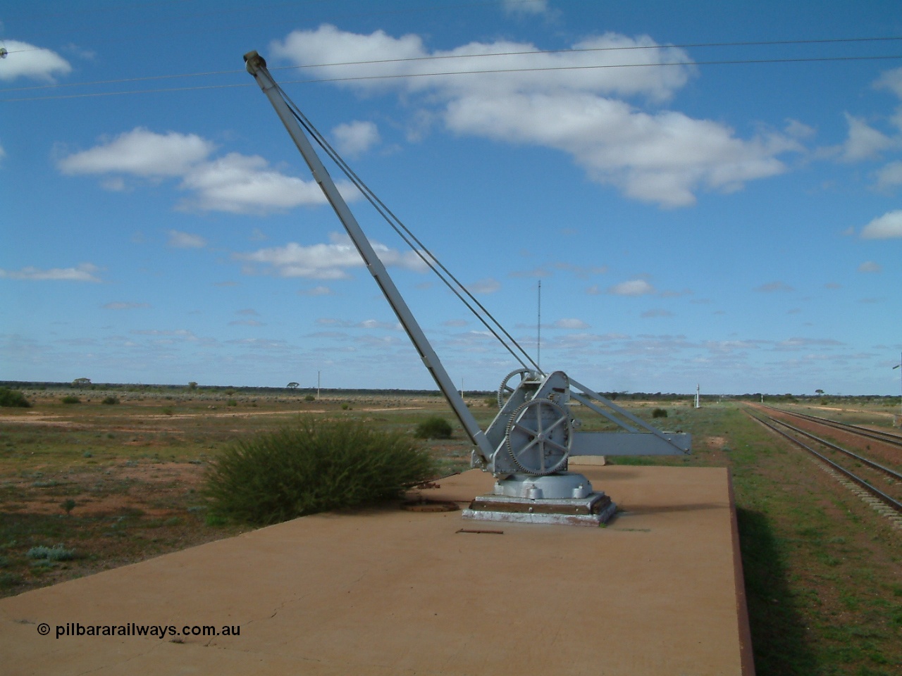 030415 140027
Kingoonya, located at the 426.5 km on the Trans Australian Railway, top of loading ramp and crane. Located on the north side of the line. [url=https://goo.gl/maps/JoaJ36uYKDkgepas9]GeoData location[/url].
