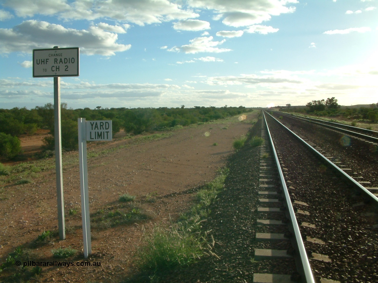 030415 171516
Tarcoola, at the 504.5 km, looking west along the Trans Australian line, Central Australian line on the right at the western yard limit and radio channel change boards. Tarcoola is the junction for the TAR and CAR railways. [url=https://goo.gl/maps/HiaY1eD55ojKxzvt6]GeoData location[/url]. 15th April 2003.
