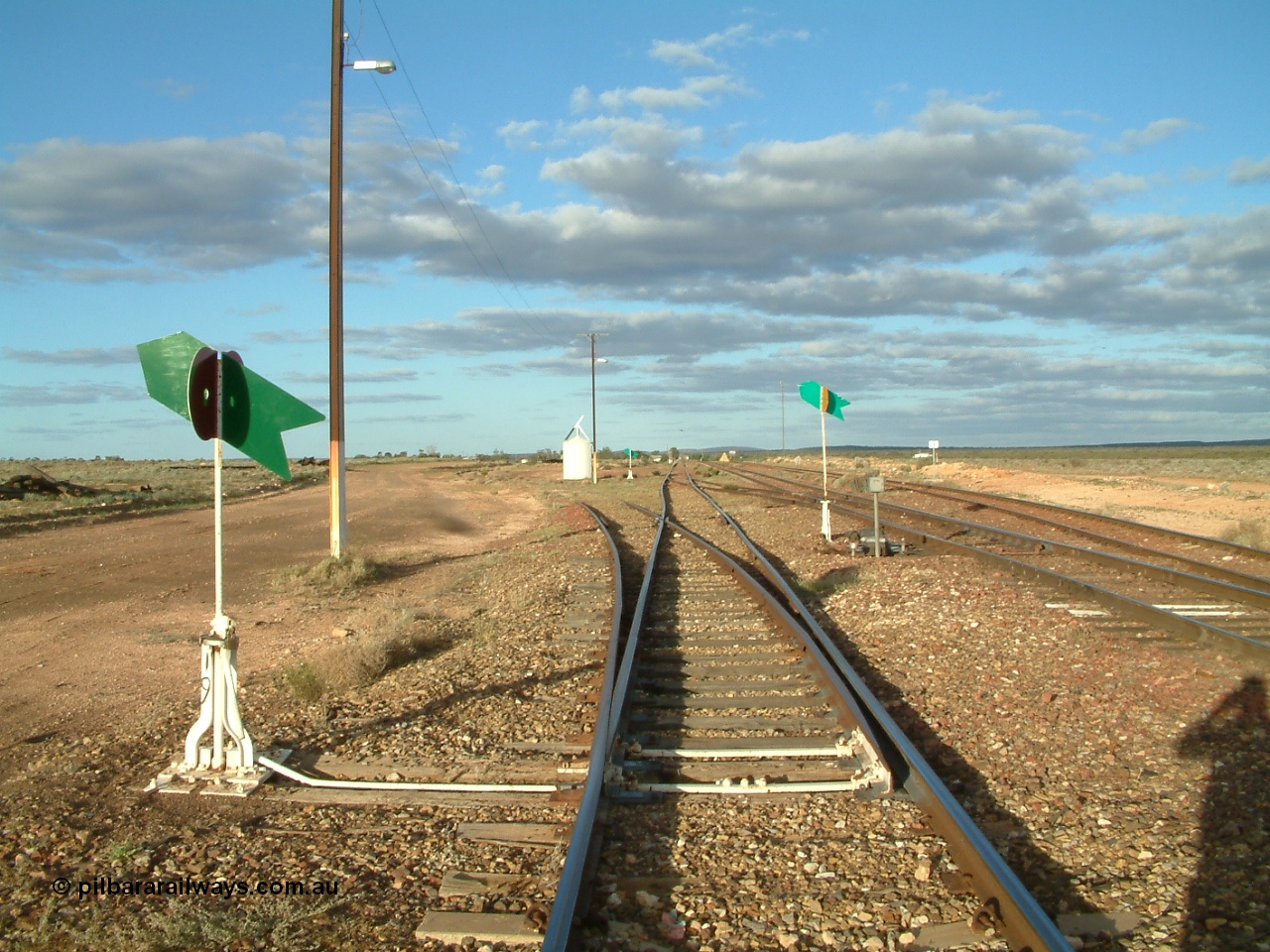 030415 171948
Tarcoola, at the 504.5 km, looking east along the Central Australian Line, Trans Australian is the middle road with the loop on the far right. Tarcoola is the junction for the TAR and CAR railways. [url=https://goo.gl/maps/81W8BzbCjzqJFd1PA]GeoData location[/url]. 15th April 2003.
