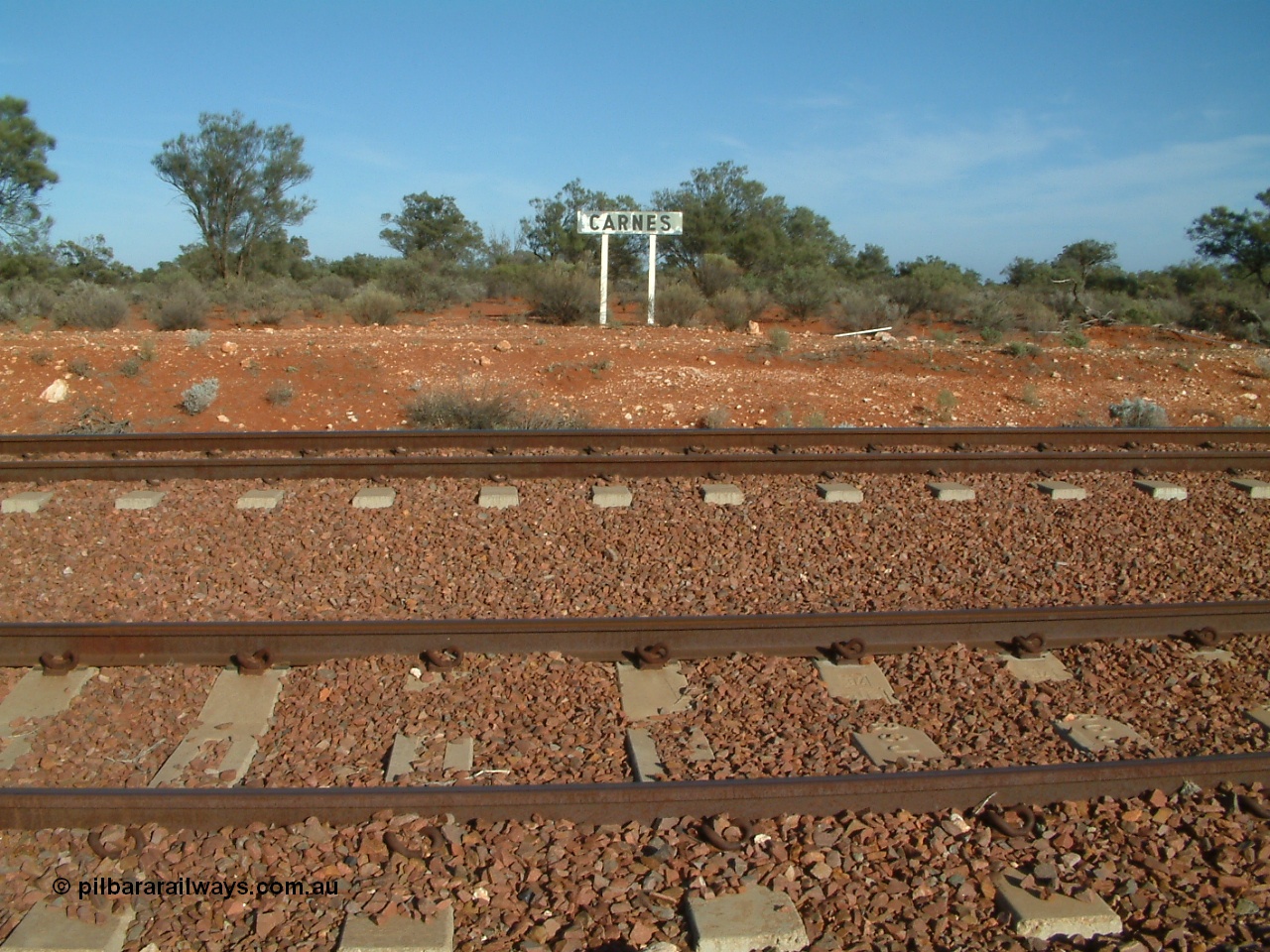030416 084004
Carnes Siding located at the 566.4 km on the Central Australian line from Tarcoola to Alice Springs. Station nameboard. [url=https://goo.gl/maps/4PBoUfKbtJfCwKLA9]GeoData location[/url]. 16th April 2003.
