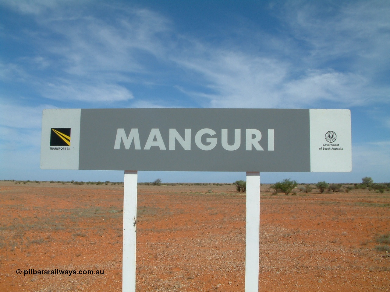 030416 110228
Manguri Siding station nameboard, located 706.5 km from the 0 datum at Coonamia and 200 km north of Tarcoola between Wirrida and Cadney Park on the Tarcoola - Alice Springs line. 16th April 2003.
