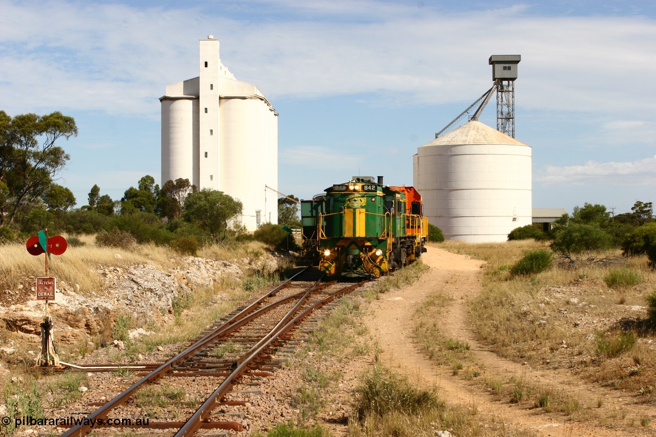 060109 2120
Kyancutta, ASR 830 class unit 842, an AE Goodwin built ALCo DL531 model loco serial 84140 leads EMD unit 1204 due to air-conditioning trouble and sister ALCo 851 as they shunt empty grain waggons on the silo loop. 9th January 2006.
Keywords: 830-class;842;AE-Goodwin;ALCo;DL531;84140;