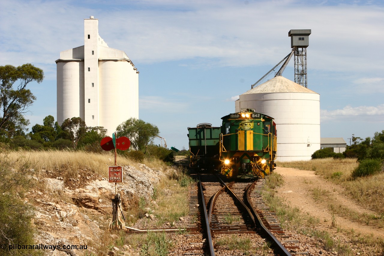 060109 2125
Kyancutta, ASR 830 class unit 842, an AE Goodwin built ALCo DL531 model loco serial 84140 leads EMD unit 1204 due to air-conditioning trouble and sister ALCo 851 as they shunt empty grain waggons on the silo loop. 9th January 2006.
Keywords: 830-class;842;AE-Goodwin;ALCo;DL531;84140;