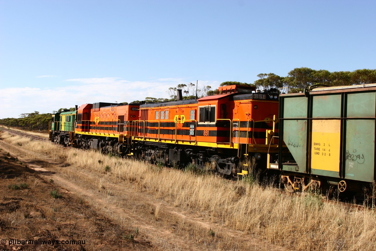 060109 2145
Wannamana, [url=https://goo.gl/maps/43EOs]on the curve[/url] 2 km north of the former station site empty train 830 class unit 851 AE Goodwin built ALCo DL531 model serial 84137 repainted into Australian Railroad Group livery with an EMD 1200 class and a sister ALCo unit on the lead. 9th January 2006.
Keywords: 830-class;851;AE-Goodwin;ALCo;DL531;84137;