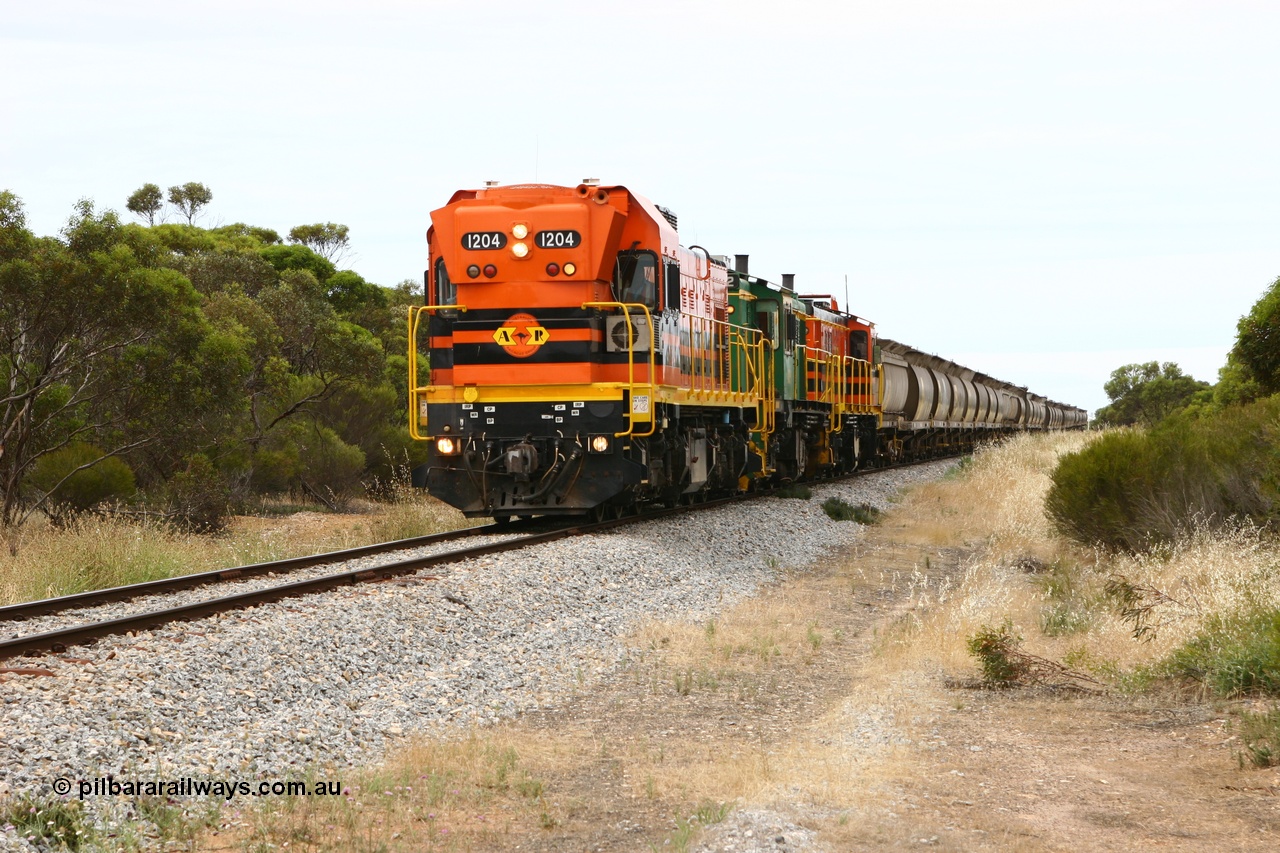 060110 2151
Pillana, former station site, 59 km, empty grain train behind ARG 1200 class unit 1204, a Clyde Engineering EMD model G12C serial 65-428, originally built for the WAGR as the final unit of fourteen A class locomotives in 1965 then sent to the Eyre Peninsula in July 2004, and two 830 class AE Goodwin built ALCo model DL531 units 842 serial 84140 ex SAR broad gauge to Eyre Peninsula in October 1987, and 851 serial 84137 new to Eyre Peninsula in 1962. [url=https://goo.gl/maps/BcnmpGwGqtw]Approx. location of photo[/url].
Keywords: 1200-class;1204;Clyde-Engineering-Granville-NSW;EMD;G12C;65-428;A-class;A1514;830-class;842;851;AE-Goodwin;ALCo;DL531;84137;84140;