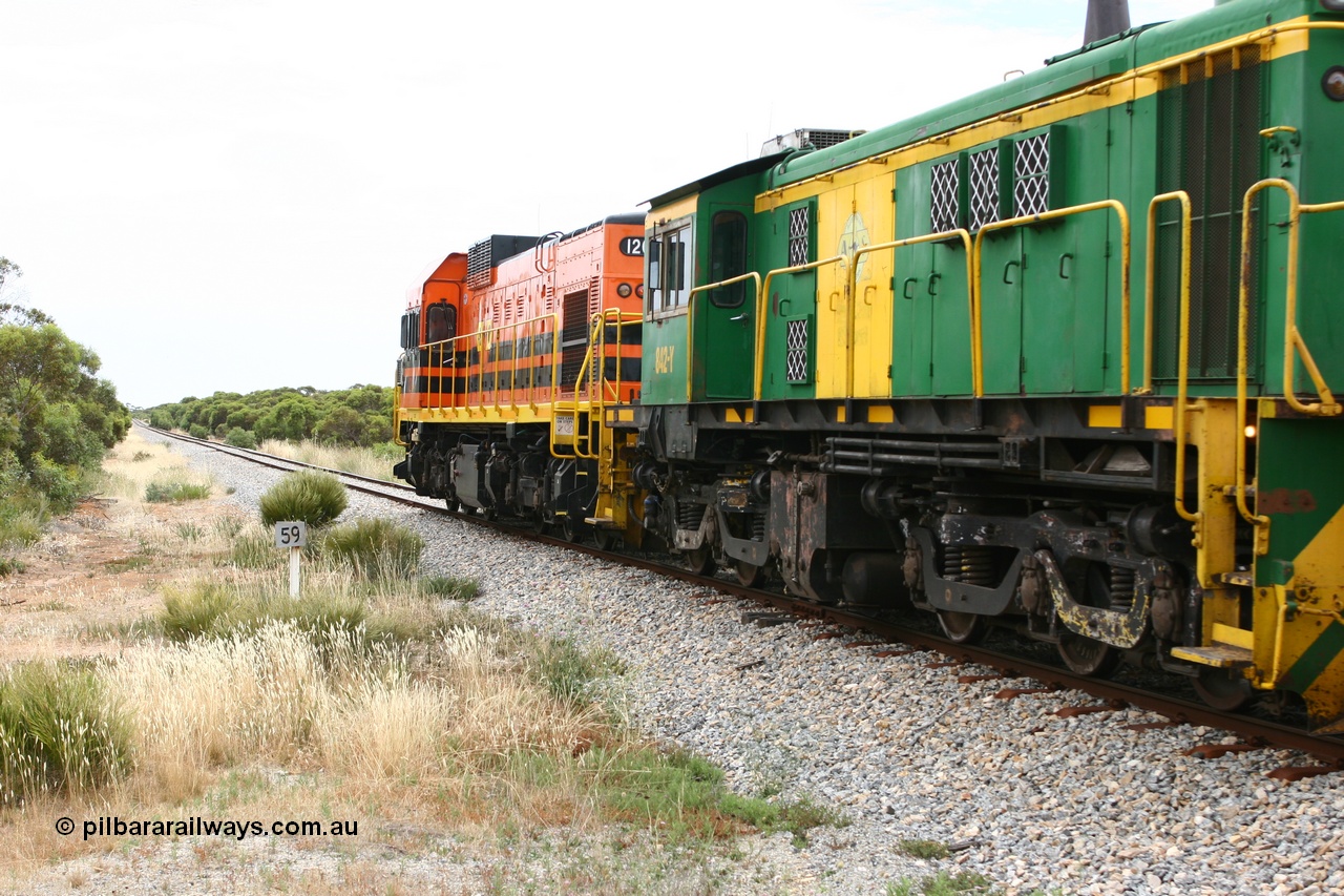 060110 2154
Pillana, former station site, 59 km, empty grain train behind ARG 1200 class unit 1204, a Clyde Engineering EMD model G12C serial 65-428, originally built for the WAGR as the final unit of fourteen A class locomotives in 1965 then sent to the Eyre Peninsula in July 2004, and two 830 class AE Goodwin built ALCo model DL531 units 842 serial 84140 ex SAR broad gauge to Eyre Peninsula in October 1987, and 851 serial 84137 new to Eyre Peninsula in 1962. [url=https://goo.gl/maps/BcnmpGwGqtw]Approx. location of photo[/url].
Keywords: 1200-class;1204;Clyde-Engineering-Granville-NSW;EMD;G12C;65-428;A-class;A1514;830-class;842;851;AE-Goodwin;ALCo;DL531;84137;84140;
