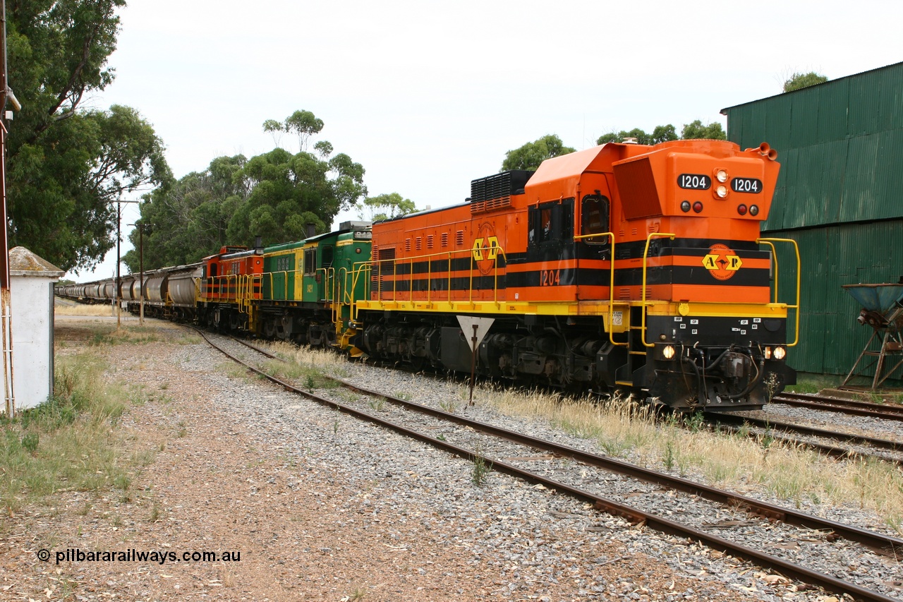 060110 2167
Cummins, view across Railway Terrace of empty grain train runs into the yard along the mainline having completed its' shunt behind ARG 1200 class unit 1204, a Clyde Engineering EMD model G12C serial 65-428, originally built for the WAGR as the final unit of fourteen A class locomotives in 1965 and sent to the Eyre Peninsula in July 2004 and two 830 class AE Goodwin built ALCo model DL531 units 842 serial 84140 ex SAR broad gauge to Eyre Peninsula in October 1987, and 851 serial 84137 new to Eyre Peninsula in 1962. [url=https://goo.gl/maps/q5aVqSmjCP62]Approx. location of image[/url].
Keywords: 1200-class;1204;Clyde-Engineering-Granville-NSW;EMD;G12C;65-428;A-class;A1514;830-class;842;851;AE-Goodwin;ALCo;DL531;84137;84140;