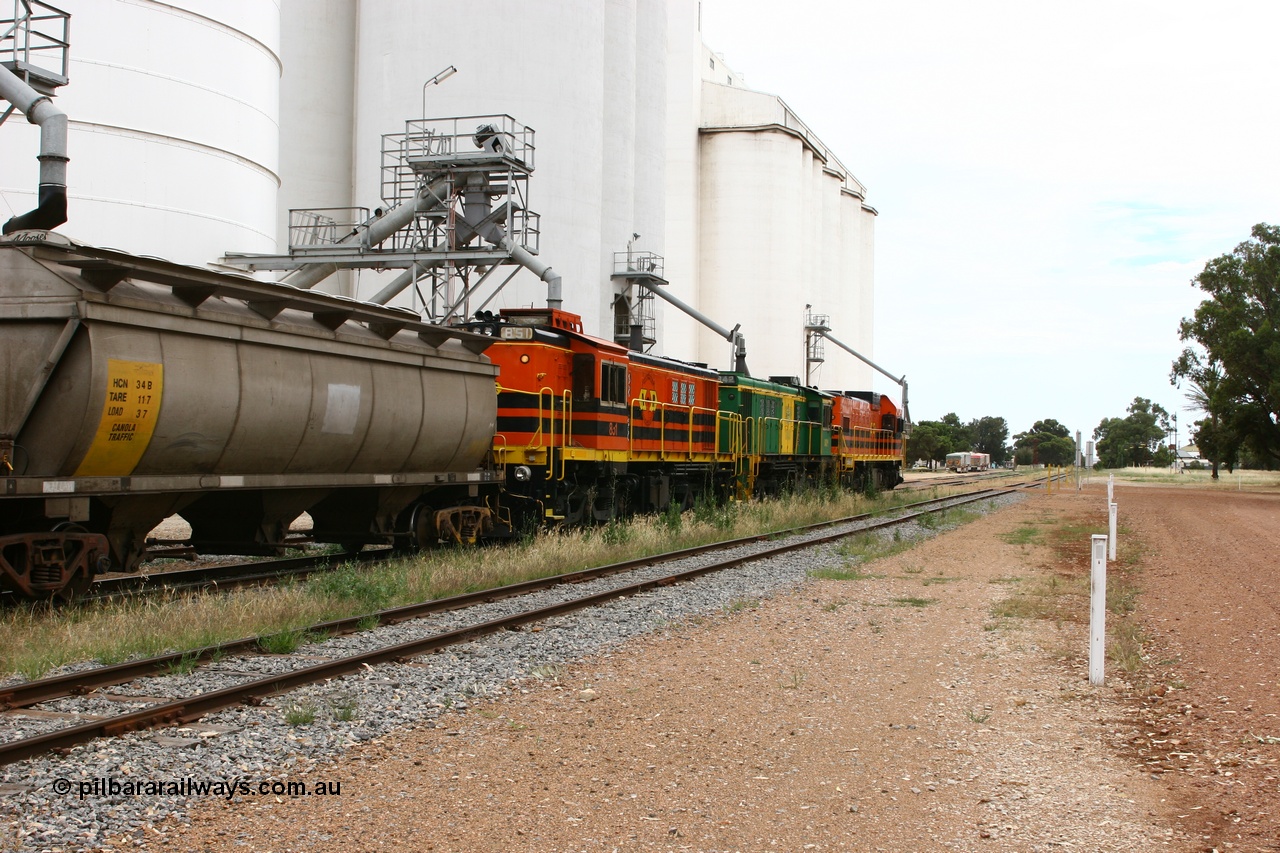 060110 2169
Cummins, trailing view of empty grain train running down the yard along the Penong mainline behind ARG 1200 class unit 1204, a Clyde Engineering EMD model G12C serial 65-428, originally built for the WAGR as the final unit of fourteen A class locomotives in 1965 and sent to the Eyre Peninsula in July 2004 and two 830 class AE Goodwin built ALCo model DL531 units 842 serial 84140 ex SAR broad gauge to Eyre Peninsula in October 1987, and 851 serial 84137 new to Eyre Peninsula in 1962. [url=https://goo.gl/maps/q5aVqSmjCP62]Approx. location of image[/url].
Keywords: 1200-class;1204;Clyde-Engineering-Granville-NSW;EMD;G12C;65-428;A-class;A1514;830-class;842;851;AE-Goodwin;ALCo;DL531;84137;84140;