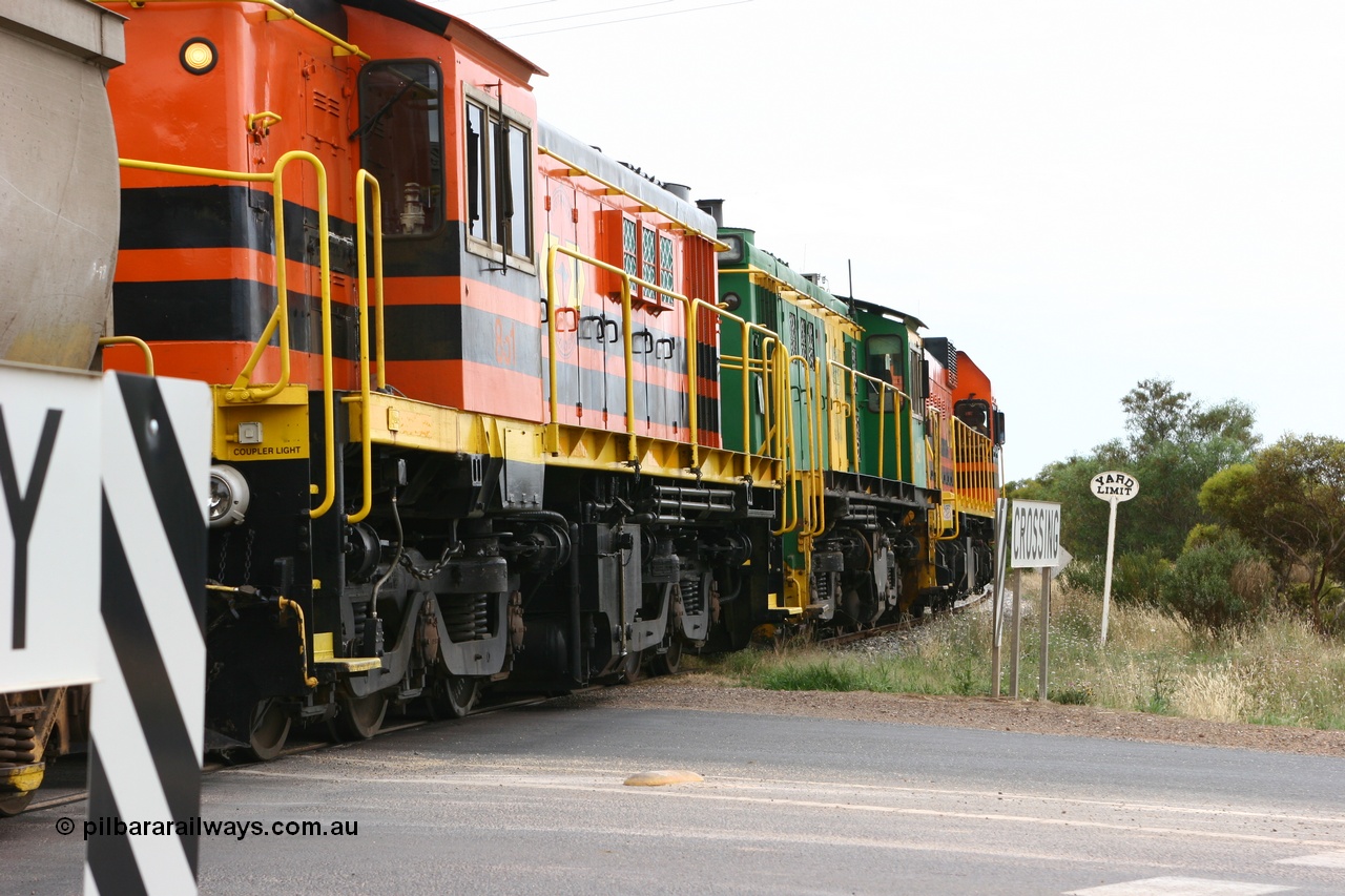 060110 2174
Cummins, empty grain train departing yard on the Penong mainline at the Bratten Way grade crossing behind ARG 1200 class unit 1204, a Clyde Engineering EMD model G12C serial 65-428, originally built for the WAGR as the final unit of fourteen A class locomotives in 1965 and sent to the Eyre Peninsula in July 2004 and two 830 class AE Goodwin built ALCo model DL531 units 842 serial 84140 ex SAR broad gauge to Eyre Peninsula in October 1987, and 851 serial 84137 new to Eyre Peninsula in 1962. [url=https://goo.gl/maps/cL7ZN9y12t92]Approx. location of image[/url].
Keywords: 1200-class;1204;Clyde-Engineering-Granville-NSW;EMD;G12C;65-428;A-class;A1514;830-class;842;851;AE-Goodwin;ALCo;DL531;84137;84140;