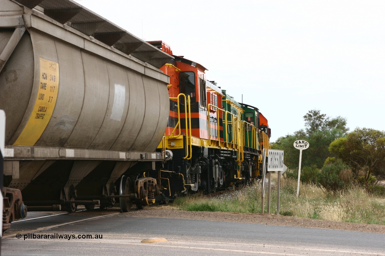 060110 2175
Cummins, empty grain train departing yard on the Penong mainline at the Bratten Way grade crossing behind ARG 1200 class unit 1204, a Clyde Engineering EMD model G12C serial 65-428, originally built for the WAGR as the final unit of fourteen A class locomotives in 1965 and sent to the Eyre Peninsula in July 2004 and two 830 class AE Goodwin built ALCo model DL531 units 842 serial 84140 ex SAR broad gauge to Eyre Peninsula in October 1987, and 851 serial 84137 new to Eyre Peninsula in 1962. [url=https://goo.gl/maps/cL7ZN9y12t92]Approx. location of image[/url].
Keywords: 1200-class;1204;Clyde-Engineering-Granville-NSW;EMD;G12C;65-428;A-class;A1514;830-class;842;851;AE-Goodwin;ALCo;DL531;84137;84140;