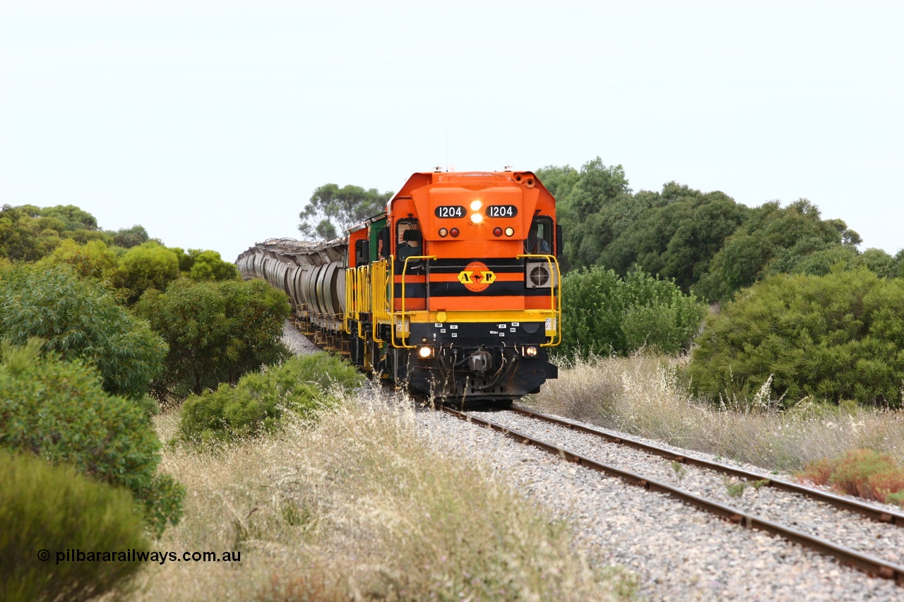 060110 2176
Near the 73 km and Cockaleechie Road grade crossing, empty grain train with ARG 1200 class unit 1204, a Clyde Engineering EMD model G12C serial 65-428, originally built for the WAGR as the final unit of fourteen A class locomotives in 1965 and sent to the Eyre Peninsula in July 2004 and two 830 class AE Goodwin built ALCo model DL531 units 842 serial 84140 ex SAR broad gauge to Eyre Peninsula in October 1987, and 851 serial 84137 new to Eyre Peninsula in 1962. [url=https://goo.gl/maps/LoznGHgHTUC2]Approx. location of image[/url].
Keywords: 1200-class;1204;Clyde-Engineering-Granville-NSW;EMD;G12C;65-428;A-class;A1514;830-class;842;851;AE-Goodwin;ALCo;DL531;84137;84140;