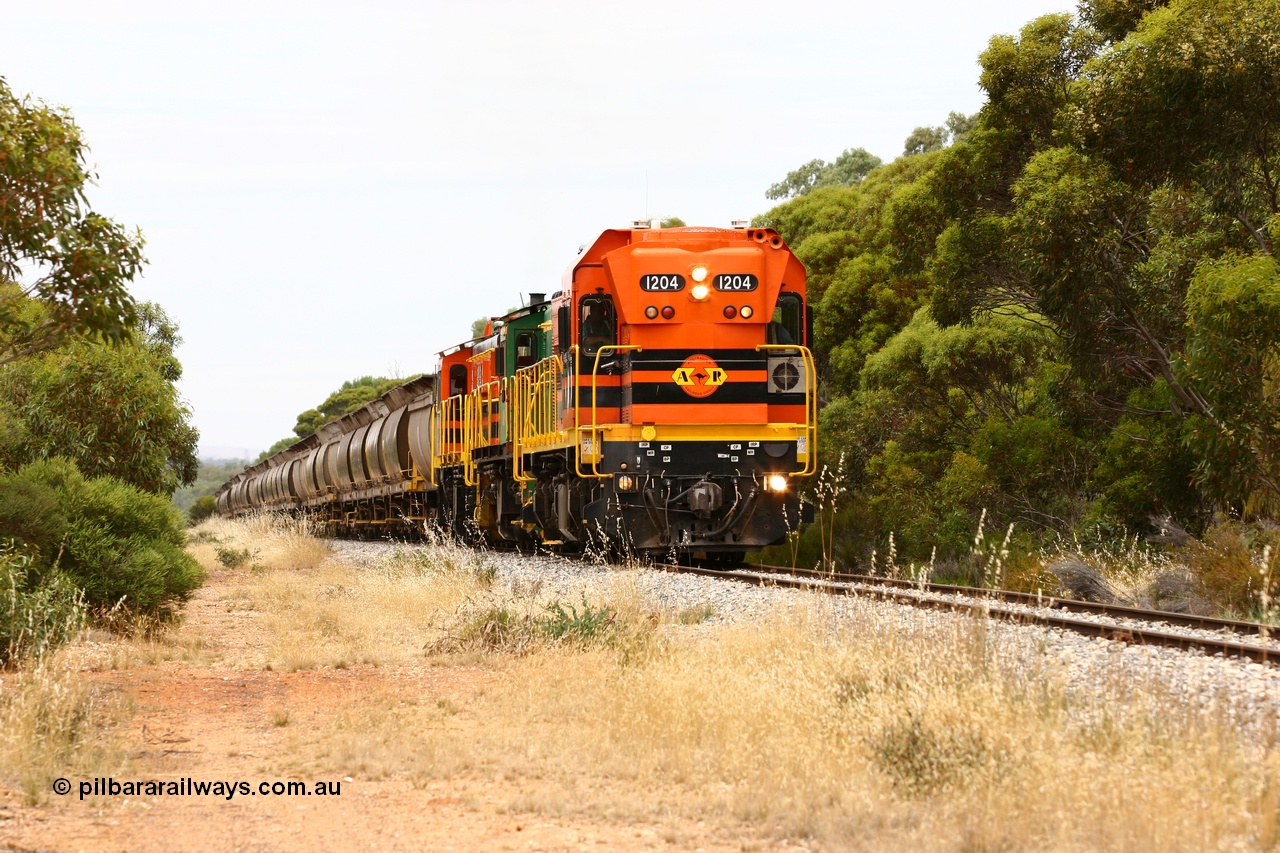 060110 2182
Near the 78 km, empty grain train with ARG 1200 class unit 1204, a Clyde Engineering EMD model G12C serial 65-428, originally built for the WAGR as the final unit of fourteen A class locomotives in 1965 and sent to the Eyre Peninsula in July 2004 and two 830 class AE Goodwin built ALCo model DL531 units 842 serial 84140 ex SAR broad gauge to Eyre Peninsula in October 1987, and 851 serial 84137 new to Eyre Peninsula in 1962. [url=https://goo.gl/maps/bAmc6CyEwC42]Approx. location of image[/url].
Keywords: 1200-class;1204;Clyde-Engineering-Granville-NSW;EMD;G12C;65-428;A-class;A1514;830-class;842;851;AE-Goodwin;ALCo;DL531;84137;84140;