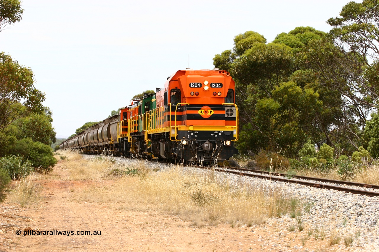 060110 2183
Near the 78 km, empty grain train with ARG 1200 class unit 1204, a Clyde Engineering EMD model G12C serial 65-428, originally built for the WAGR as the final unit of fourteen A class locomotives in 1965 and sent to the Eyre Peninsula in July 2004 and two 830 class AE Goodwin built ALCo model DL531 units 842 serial 84140 ex SAR broad gauge to Eyre Peninsula in October 1987, and 851 serial 84137 new to Eyre Peninsula in 1962. [url=https://goo.gl/maps/bAmc6CyEwC42]Approx. location of image[/url].
Keywords: 1200-class;1204;Clyde-Engineering-Granville-NSW;EMD;G12C;65-428;A-class;A1514;830-class;842;851;AE-Goodwin;ALCo;DL531;84137;84140;