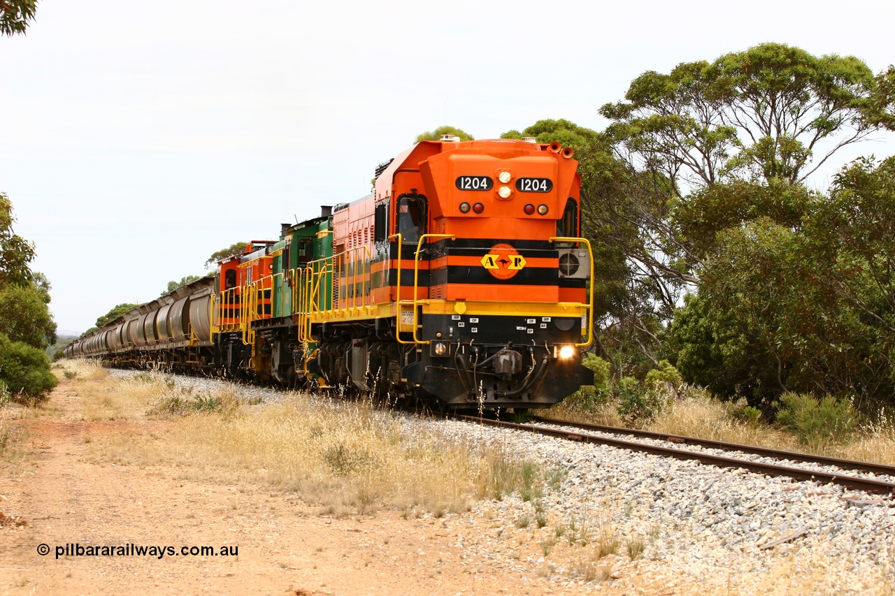 060110 2184
Near the 78 km, empty grain train with ARG 1200 class unit 1204, a Clyde Engineering EMD model G12C serial 65-428, originally built for the WAGR as the final unit of fourteen A class locomotives in 1965 and sent to the Eyre Peninsula in July 2004 and two 830 class AE Goodwin built ALCo model DL531 units 842 serial 84140 ex SAR broad gauge to Eyre Peninsula in October 1987, and 851 serial 84137 new to Eyre Peninsula in 1962. [url=https://goo.gl/maps/bAmc6CyEwC42]Approx. location of image[/url].
Keywords: 1200-class;1204;Clyde-Engineering-Granville-NSW;EMD;G12C;65-428;A-class;A1514;830-class;842;851;AE-Goodwin;ALCo;DL531;84137;84140;