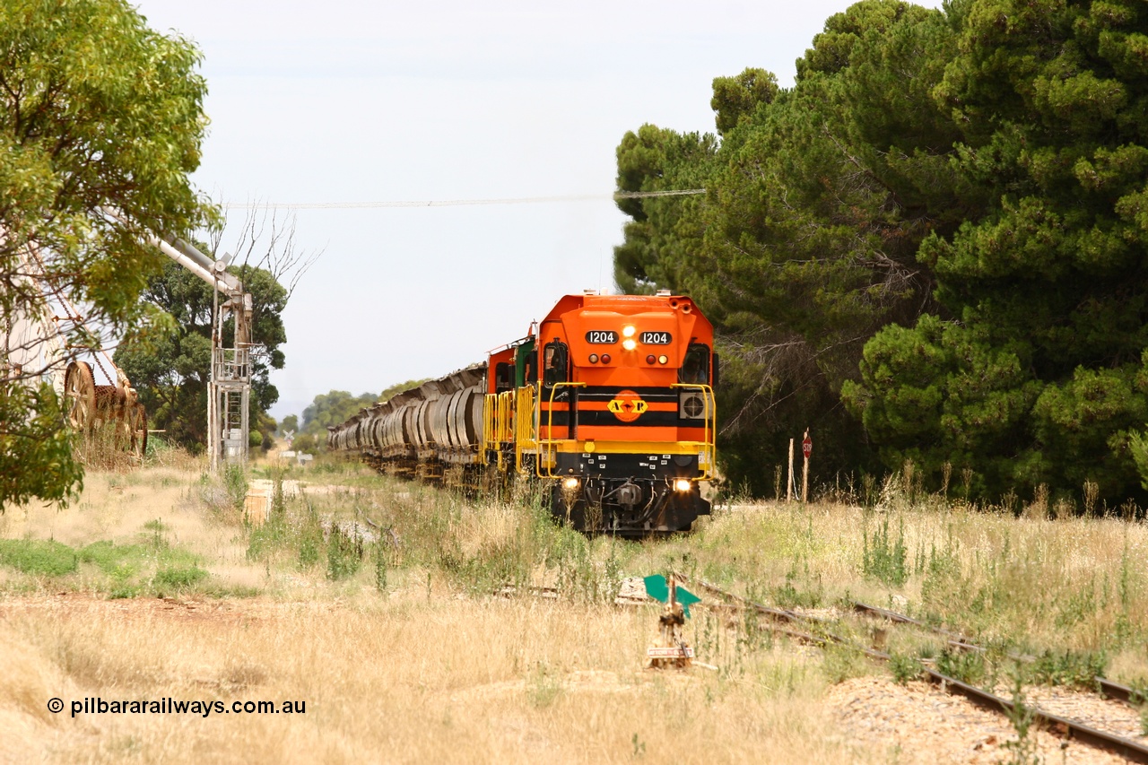 060110 2187
Yeelanna, empty grain arriving to shunt off empty hoppers, behind ARG 1200 class unit 1204, a Clyde Engineering EMD model G12C serial 65-428, originally built for the WAGR as the final unit of fourteen A class locomotives in 1965. Sent to the Eyre Peninsula in July 2004. [url=https://goo.gl/maps/1JetzWBTGAw]Approx. location of image[/url].
Keywords: 1200-class;1204;Clyde-Engineering-Granville-NSW;EMD;G12C;65-428;A-class;A1514;