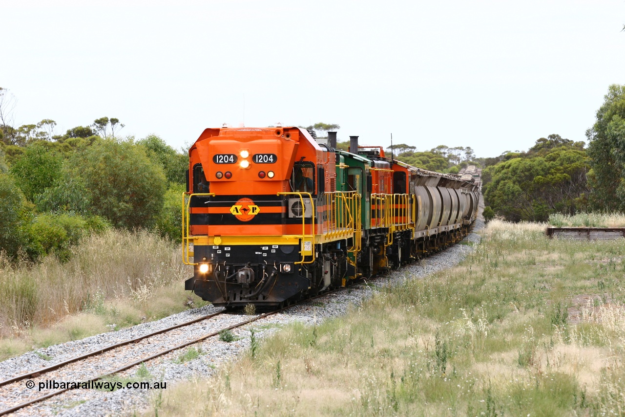 060110 2229
Karkoo, empty grain train behind ARG 1200 class unit 1204, a Clyde Engineering EMD model G12C serial 65-428, originally built for the WAGR as the final unit of fourteen A class locomotives in 1965 and sent to the Eyre Peninsula in July 2004 and two 830 class AE Goodwin built ALCo model DL531 units 842 serial 84140 ex SAR broad gauge and to Eyre Peninsula in October 1987, and 851 serial 84137 new to Eyre Peninsula in 1962. [url=https://goo.gl/maps/syz89ziXmoL2]Approx. location of image[/url].
Keywords: 1200-class;1204;Clyde-Engineering-Granville-NSW;EMD;G12C;65-428;A-class;A1514;