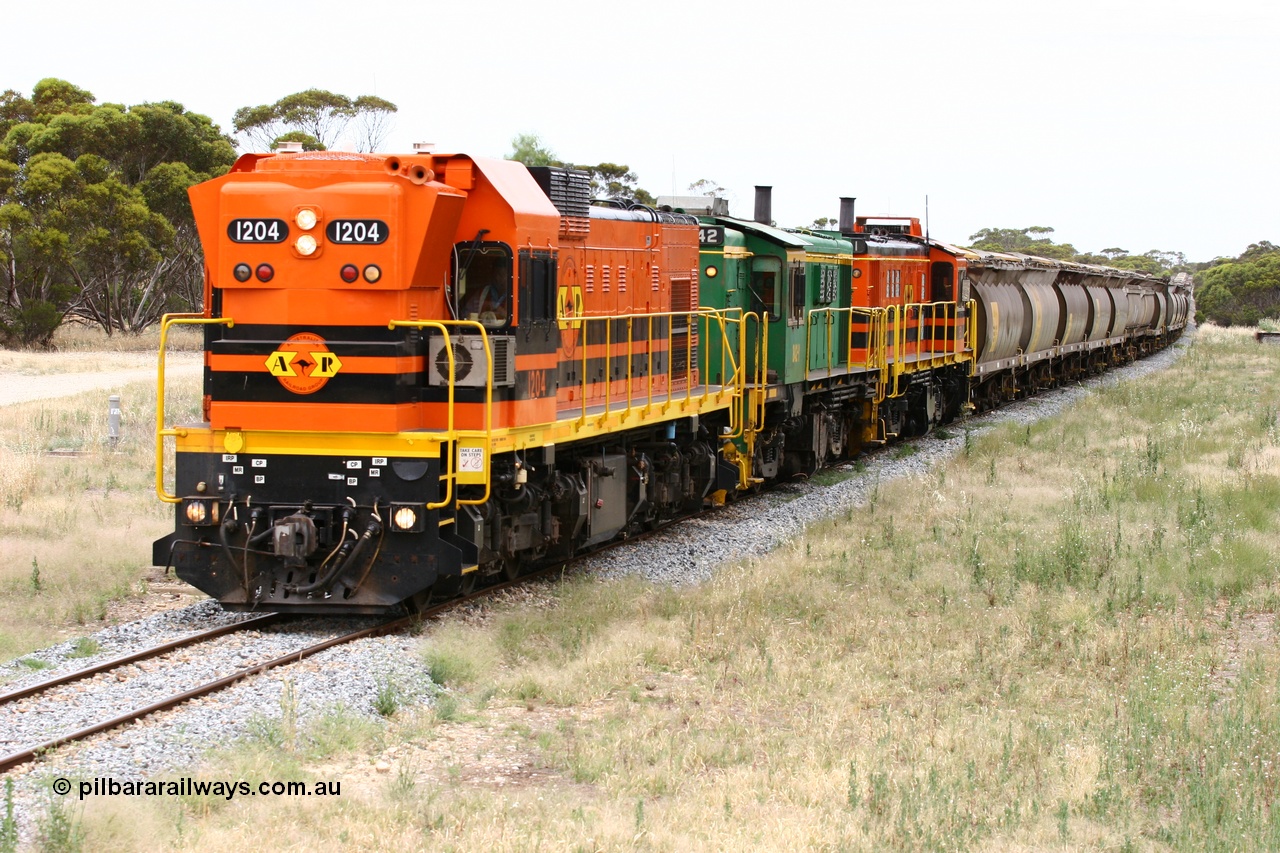 060110 2234
Karkoo, empty grain train behind ARG 1200 class unit 1204, a Clyde Engineering EMD model G12C serial 65-428, originally built for the WAGR as the final unit of fourteen A class locomotives in 1965 and sent to the Eyre Peninsula in July 2004 and two 830 class AE Goodwin built ALCo model DL531 units 842 serial 84140 ex SAR broad gauge and to Eyre Peninsula in October 1987, and 851 serial 84137 new to Eyre Peninsula in 1962. [url=https://goo.gl/maps/syz89ziXmoL2]Approx. location of image[/url].
Keywords: 1200-class;1204;Clyde-Engineering-Granville-NSW;EMD;G12C;65-428;A-class;A1514;830-class;842;851;AE-Goodwin;ALCo;DL531;84137;84140;