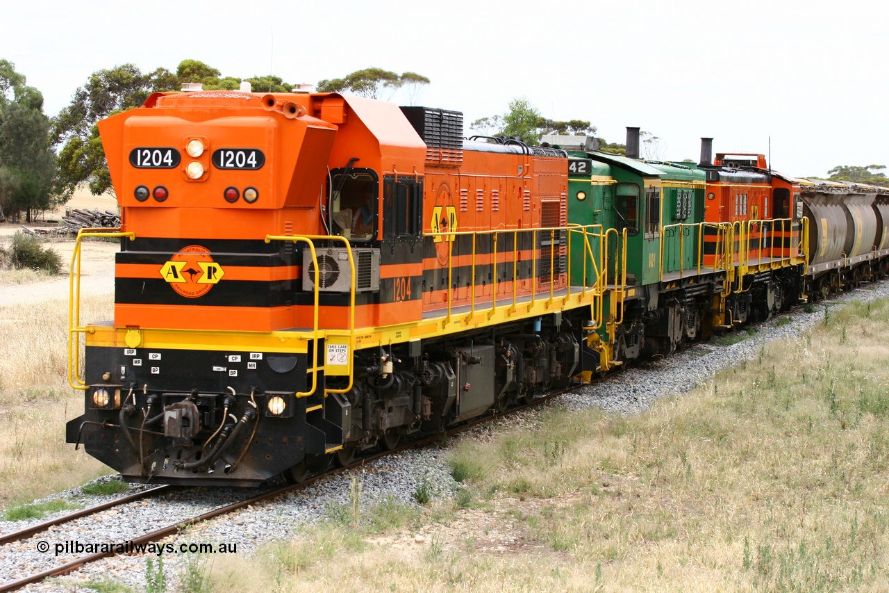 060110 2235
Karkoo, empty grain train behind ARG 1200 class unit 1204, a Clyde Engineering EMD model G12C serial 65-428, originally built for the WAGR as the final unit of fourteen A class locomotives in 1965 and sent to the Eyre Peninsula in July 2004 and two 830 class AE Goodwin built ALCo model DL531 units 842 serial 84140 ex SAR broad gauge and to Eyre Peninsula in October 1987, and 851 serial 84137 new to Eyre Peninsula in 1962. [url=https://goo.gl/maps/syz89ziXmoL2]Approx. location of image[/url].
Keywords: 1200-class;1204;Clyde-Engineering-Granville-NSW;EMD;G12C;65-428;A-class;A1514;830-class;842;851;AE-Goodwin;ALCo;DL531;84137;84140;