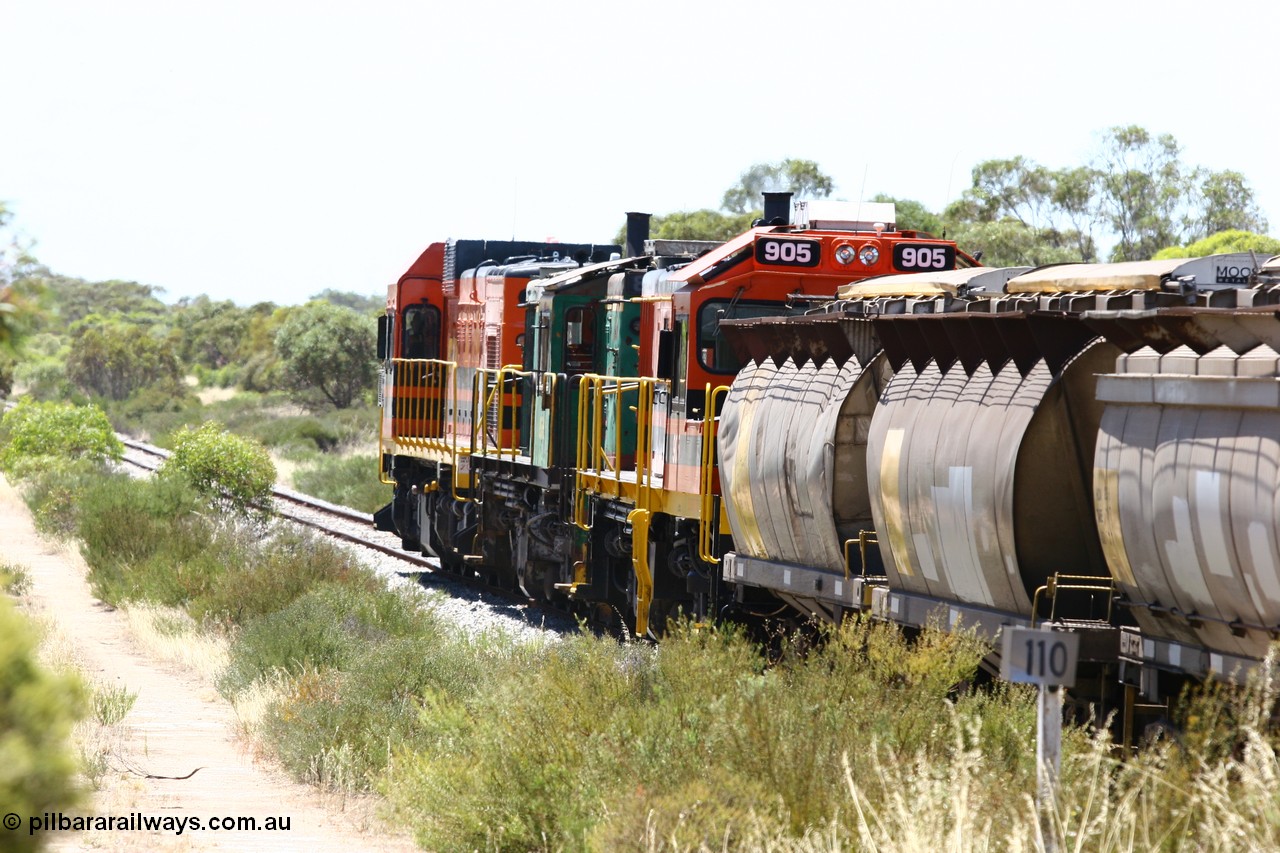 060111 2252
Tooligie, Mac's Road grade crossing at the 110 km, ARG 1200 class unit 1203, a Clyde Engineering EMD model G12C serial 65-427, one of fourteen originally built between 1960-65 for WAGR as their A class A 1513, fitted with dynamic brakes and financed by Western Mining Corporation, started working on the Eyre Peninsula in November 2004 leads an empty grain train north. 11th January 2006.
