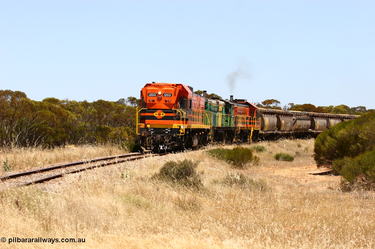 060111 2282
Murdinga, rounding the curve before entering the station environs empty grain train running north behind ARG 1200 class unit 1203, a Clyde Engineering EMD model G12C serial 65-427, one of fourteen originally built between 1960-65 for WAGR as their A class A 1513, fitted with dynamic brakes and financed by Western Mining Corporation, started working on the Eyre Peninsula in November 2004. 11th January 2006.
Keywords: 1200-class;1203;Clyde-Engineering-Granville-NSW;EMD;G12C;65-427;A-class;A1513;