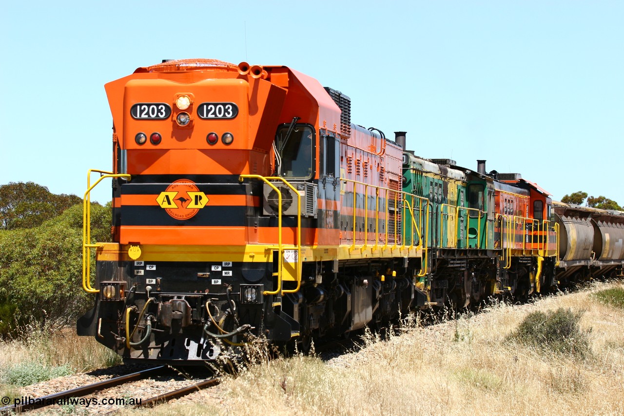 060111 2285
Murdinga, rounding the curve before entering the station environs empty grain train running north behind ARG 1200 class unit 1203, a Clyde Engineering EMD model G12C serial 65-427, one of fourteen originally built between 1960-65 for WAGR as their A class A 1513, fitted with dynamic brakes and financed by Western Mining Corporation, started working on the Eyre Peninsula in November 2004. 11th January 2006.
Keywords: 1200-class;1203;Clyde-Engineering-Granville-NSW;EMD;G12C;65-427;A-class;A1513;