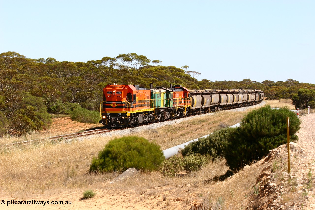 060111 2309
Kopi, an empty Clyde Engineering built EMD G12C model loco 1203 serial 65-427 leads two ALCo 830 class units 850 and 905. Their next shunt will be Warramboo. 11th January 2006.
Keywords: 1200-class;1203;Clyde-Engineering-Granville-NSW;EMD;G12C;65-427;A-class;A1513;