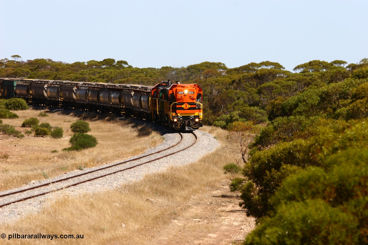 060111 2312
Nantuma, Clyde Engineering built EMD G12C model loco 1203 serial 65-427 leads two ALCo units 850 and 905 as they round the bend just north of the old station site at the 183 km. Their next shunt will be Warramboo. 11th January 2006.
Keywords: 1200-class;1203;Clyde-Engineering-Granville-NSW;EMD;G12C;65-427;A-class;A1513;