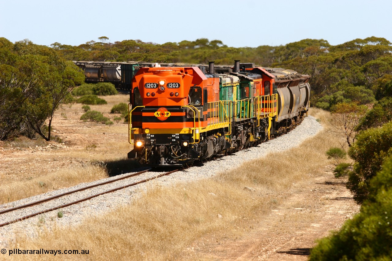 060111 2314
Nantuma, Clyde Engineering built EMD G12C model loco 1203 serial 65-427 leads two ALCo units 850 and 905 as they round the bend just north of the old station site at the 183 km. Their next shunt will be Warramboo. 11th January 2006.
Keywords: 1200-class;1203;Clyde-Engineering-Granville-NSW;EMD;G12C;65-427;A-class;A1513;