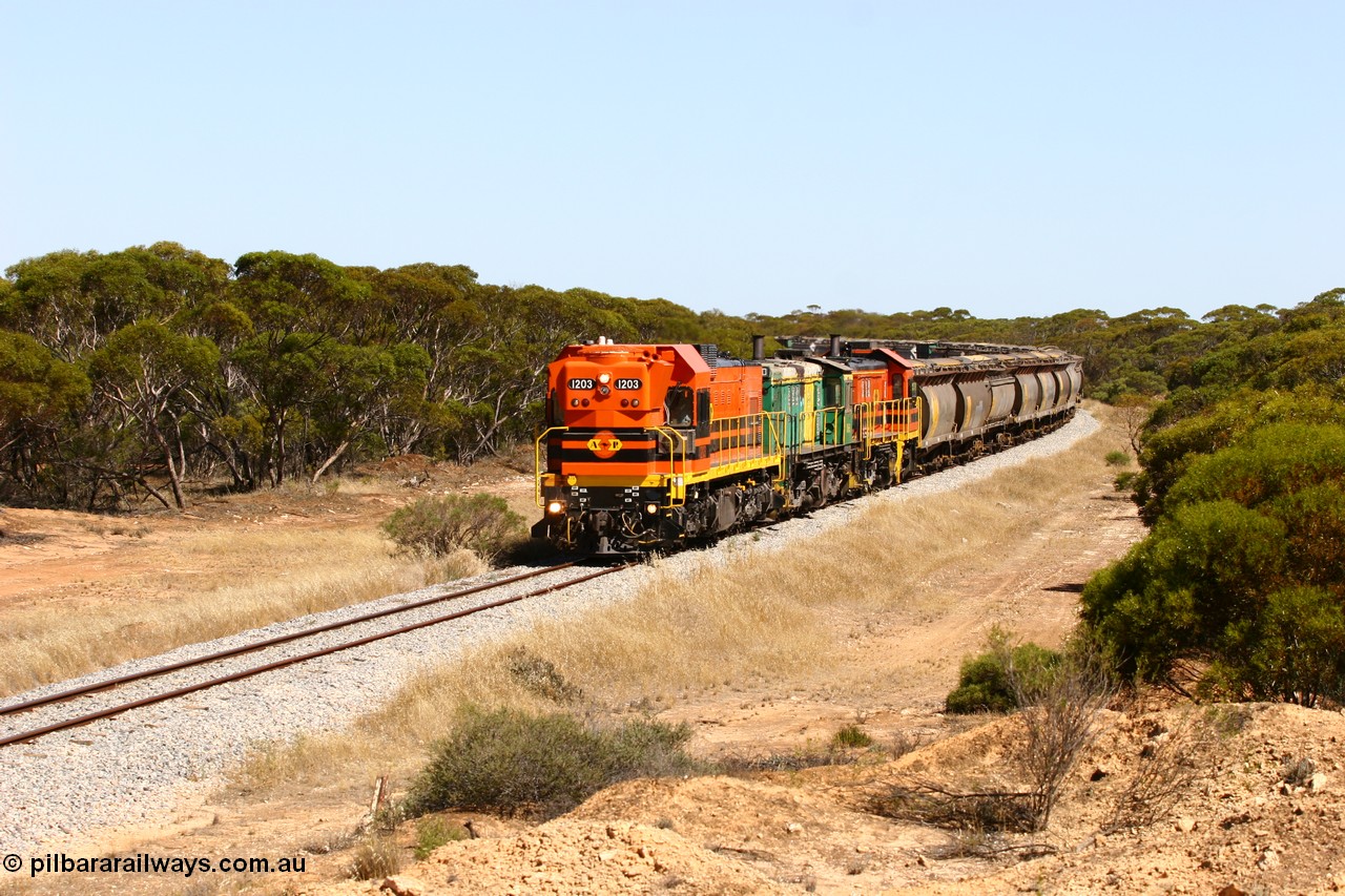 060111 2316
Nantuma, Clyde Engineering built EMD G12C model loco 1203 serial 65-427 leads two ALCo units 850 and 905 as they round the bend just north of the old station site at the 183 km. Their next shunt will be Warramboo. 11th January 2006.
Keywords: 1200-class;1203;Clyde-Engineering-Granville-NSW;EMD;G12C;65-427;A-class;A1513;