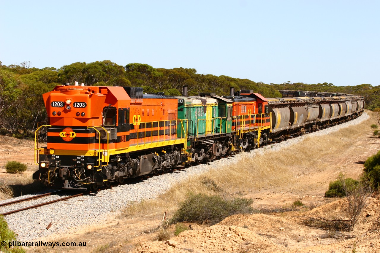 060111 2321
Nantuma, Clyde Engineering built EMD G12C model loco 1203 serial 65-427 leads two ALCo units 850 and 905 as they round the bend just north of the old station site at the 183 km. Their next shunt will be Warramboo. 11th January 2006.
Keywords: 1200-class;1203;Clyde-Engineering-Granville-NSW;EMD;G12C;65-427;A-class;A1513;
