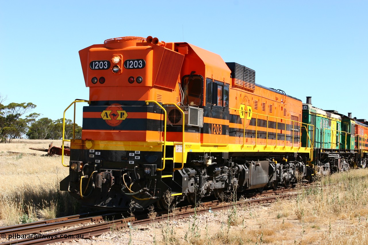 060111 2327
Warramboo, ARG 1200 class unit 1203, a Clyde Engineering EMD model G12C serial 65-427, one of fourteen originally built between 1960-65 for WAGR as their A class A 1513, fitted with dynamic brakes and financed by Western Mining Corporation, started working on the Eyre Peninsula in November 2004, here shunting back along the mainline to resume the journey north. 11th January 2006.
Keywords: 1200-class;1203;Clyde-Engineering-Granville-NSW;EMD;G12C;65-427;A-class;A1513;