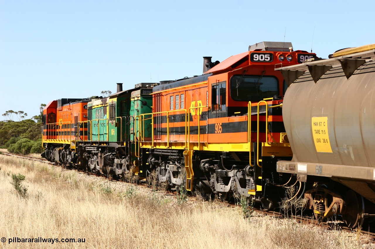060111 2339
Warramboo, ARG 900 class unit 905, originally built by AE Goodwin as 830 class unit 836 serial 83727, converted to DA class DA 6 by Australian National at Port Augusta workshops for driver only operation in 1996. Trailing unit in a north bound grain train as it crosses Kimba Road grade crossing. 11th January 2006.
Keywords: 900-class;905;AE-Goodwin;ALCo;DL531;83727;830-class;836;DA-class;DA6;