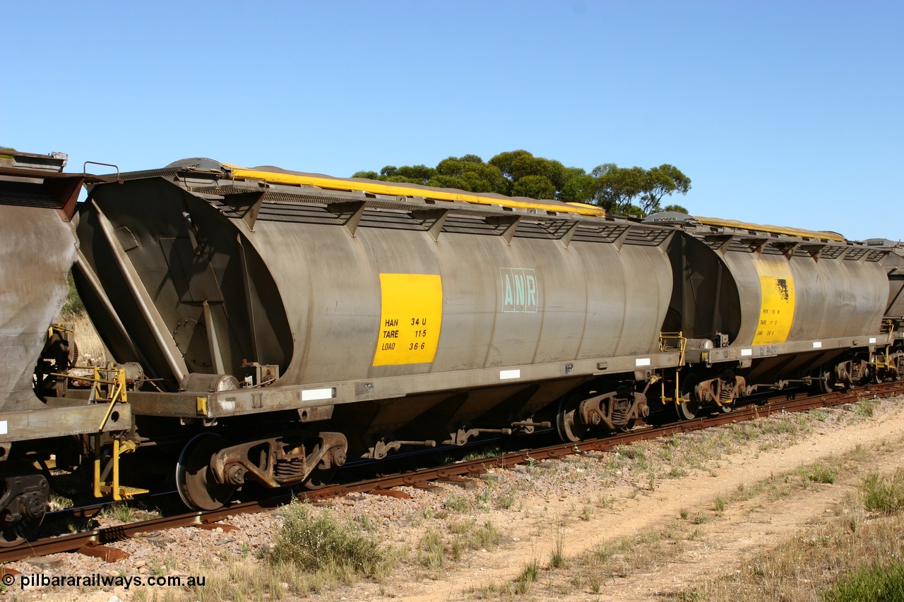 060111 2350
Kyancutta, empty grain waggons being shunted, SAR Islington Workshops built HAN type bogie wheat waggons HAN 34 with ANR logo, while HAN 15 still has the SAR logo. 11th January 2006.
Keywords: HAN-type;HAN34;1969-73/68-34;SAR-Islington-WS;