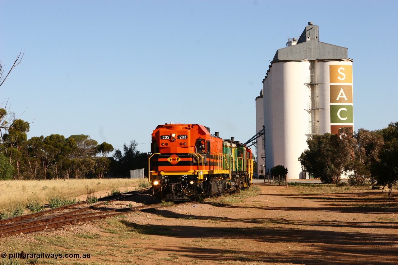 060111 2401
Wudinna, ARG 1200 class unit 1203, a Clyde Engineering EMD model G12C serial 65-427, one of fourteen originally built between 1960-65 for WAGR as their A class A 1513, fitted with dynamic brakes and financed by Western Mining Corporation, started working on the Eyre Peninsula in November 2004, shunts through the yard.
Keywords: 1200-class;1203;Clyde-Engineering-Granville-NSW;EMD;G12C;65-427;A-class;A1513;