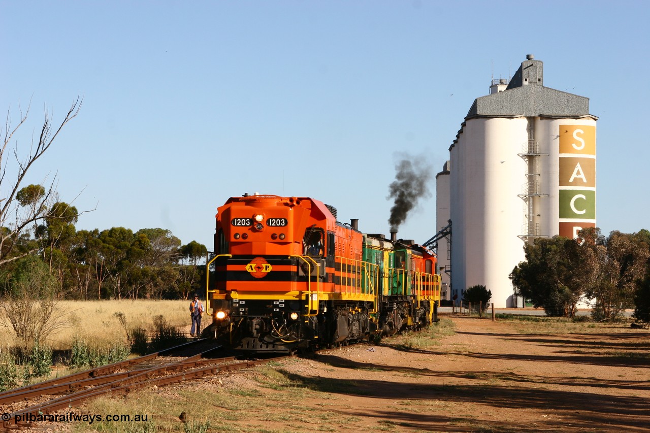 060111 2404
Wudinna, ARG 1200 class unit 1203, a Clyde Engineering EMD model G12C serial 65-427, one of fourteen originally built between 1960-65 for WAGR as their A class A 1513, fitted with dynamic brakes and financed by Western Mining Corporation, started working on the Eyre Peninsula in November 2004, shunts through the yard.
Keywords: 1200-class;1203;Clyde-Engineering-Granville-NSW;EMD;G12C;65-427;A-class;A1513;