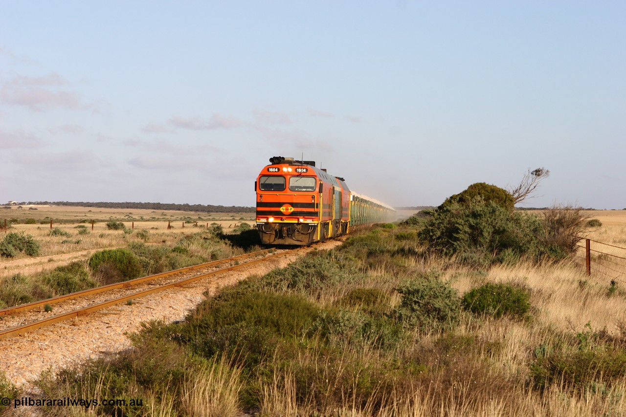 060113 2415
Ceduna, loaded gypsum train 6DD2 powers along the grades outside of town behind the triple 1600 / NJ class combination of 1604, NJ 3 and 1601 at 08:10 AM on the Friday the 13th January 2006.
Keywords: 1600-class;1604;Clyde-Engineering-Granville-NSW;EMD;JL22C;71-731;NJ-class;NJ4;