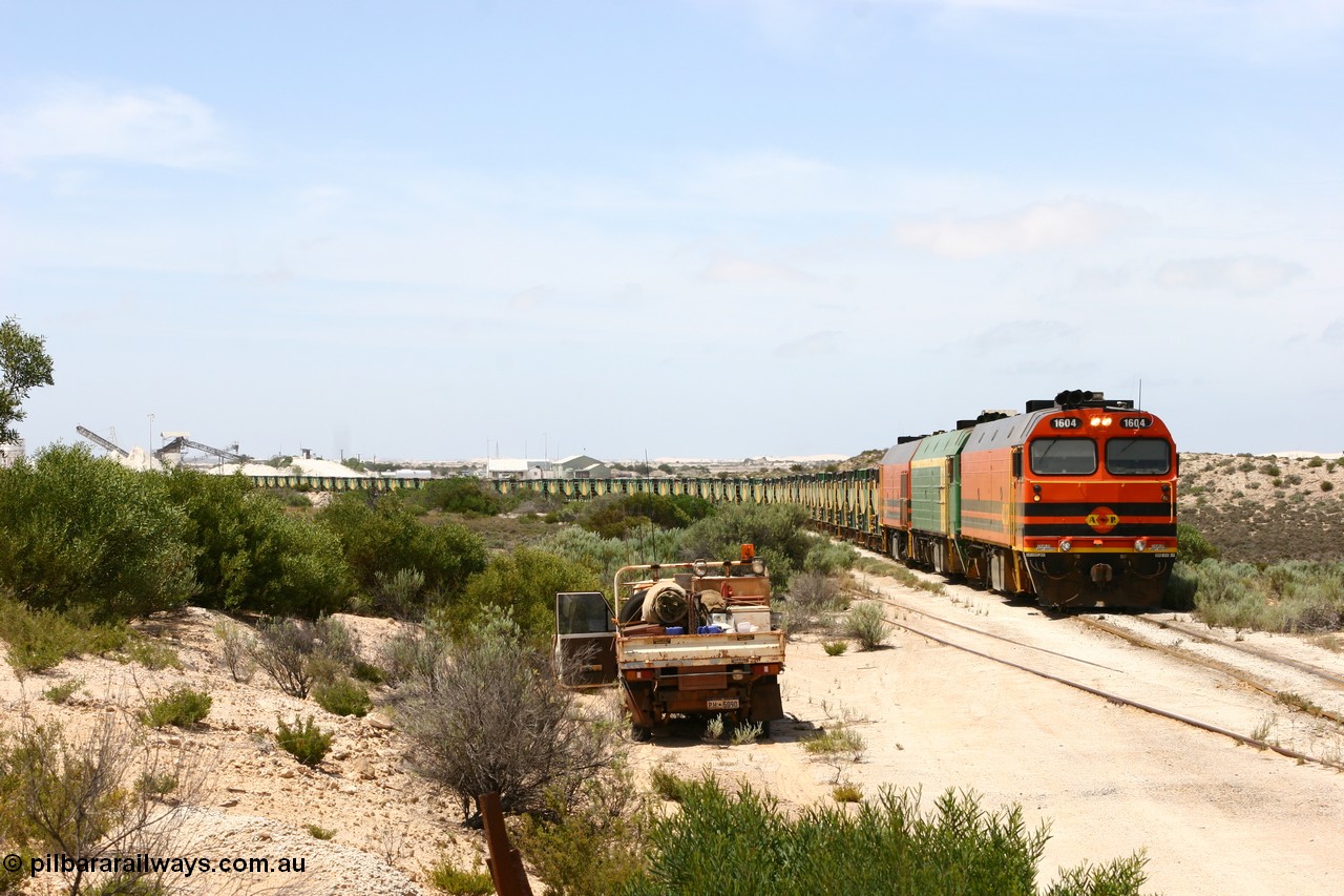 060113 2485
Kevin, ARG 1600 class narrow gauge loco 1604 a Clyde Engineering built EMD model JL22C serial 71-731, originally built for the Central Australia Railway in 1971, transferred to the Eyre Peninsula in 1981 arrives with empty gypsum train 6DD3. 13th January 2006.
Keywords: 1600-class;1604;Clyde-Engineering-Granville-NSW;EMD;JL22C;71-731;NJ-class;NJ4;