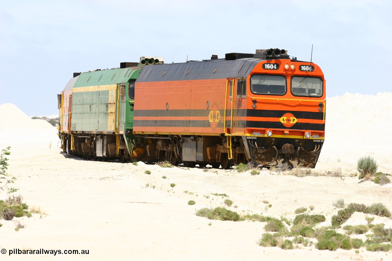 060113 2512
Kevin, empty train 6DD3 shunts back onto the triangle leg behind triple NJ/1600 class units, Clyde Engineering built EMD JL22C models, originally coded the NJ class and built for the Central Australia Railway in 1971, transferred to the Eyre Peninsula in 1981 and recoded to the 1600 class. 13th January 2006.
Keywords: 1600-class;1604;Clyde-Engineering-Granville-NSW;EMD;JL22C;71-731;NJ-class;NJ4;