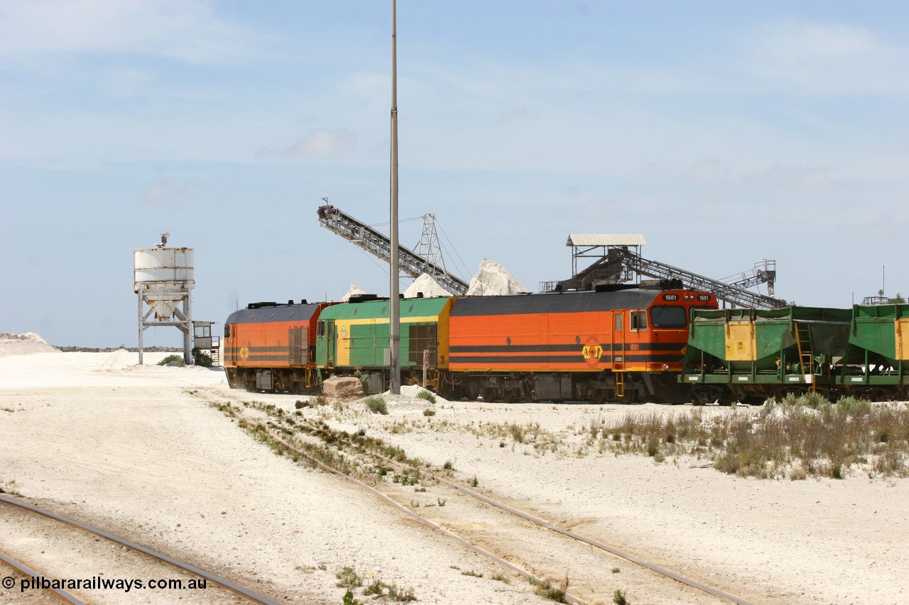 060113 2529
Kevin, empty train 6DD3 is heading onto the south leg with some of the gypsum plant behind the train and a set of original loading bins gypsum loading siding to continue the reversing process. 13th January 2006.
Keywords: 1600-class;1601;Clyde-Engineering-Granville-NSW;EMD;JL22C;71-728;NJ-class;NJ1;