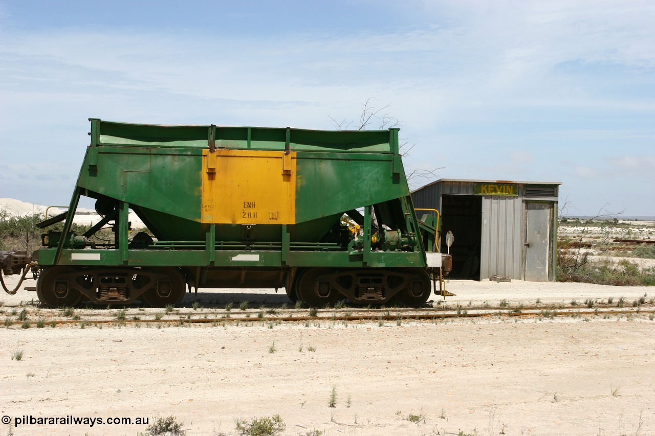 060113 2535
Kevin, originally an Kinki Sharyo built NH type for the NAR now coded ENH type ENH 28, is the last car of an empty train as it shunts back along the Penong line past the station building, [url=https://goo.gl/maps/JyRQW]Mallee shelter - train control cabin[/url], as the train is reversed prior to loading on the mainline to Thevenard. 13th January 2006.
Keywords: ENH-type;ENH28;Kinki-Sharyo-Japan;NH-type;NH928;