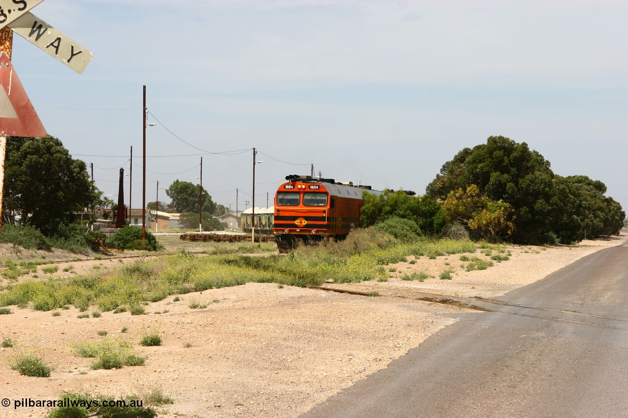 060113 2558
Thevenard, loaded gypsum train 6DD4 snakes into the yard behind 1600 class unit 1604 in Australian Railroad Group livery a Clyde Engineering built EMD JL22C model serial 71-731, originally built as NJ class NJ 4. [url=https://goo.gl/maps/9g3QoE4iaiDjqyta9]Bergmann Dr grade crossing[/url]. 13th January 2006.
Keywords: 1600-class;1604;Clyde-Engineering-Granville-NSW;EMD;JL22C;71-731;NJ-class;NJ4;