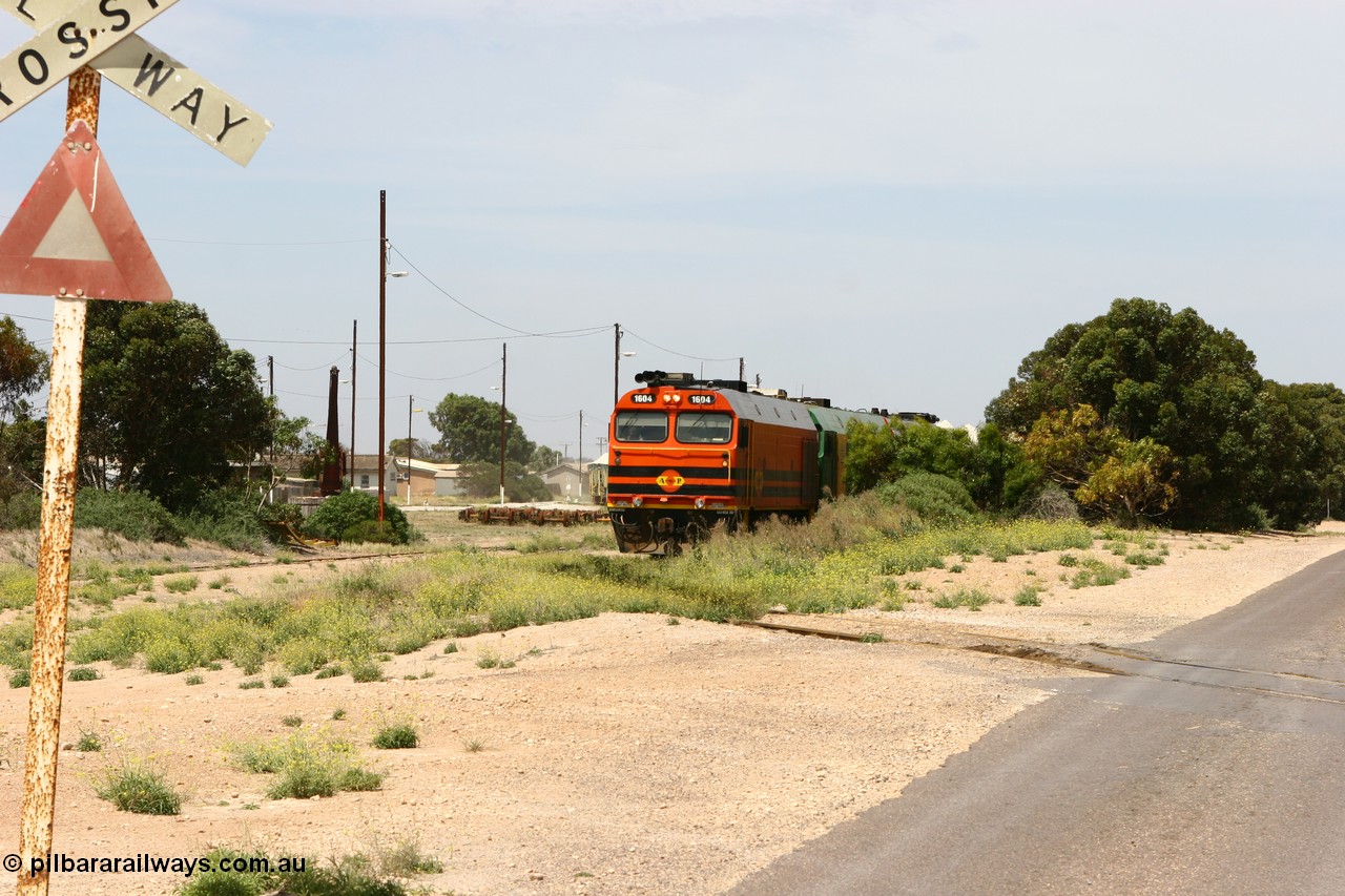 060113 2559
Thevenard, loaded gypsum train 6DD4 snakes into the yard behind 1600 class unit 1604 in Australian Railroad Group livery a Clyde Engineering built EMD JL22C model serial 71-731, originally built as NJ class NJ 4. [url=https://goo.gl/maps/9g3QoE4iaiDjqyta9]Bergmann Dr grade crossing[/url]. 13th January 2006.
Keywords: 1600-class;1604;Clyde-Engineering-Granville-NSW;EMD;JL22C;71-731;NJ-class;NJ4;