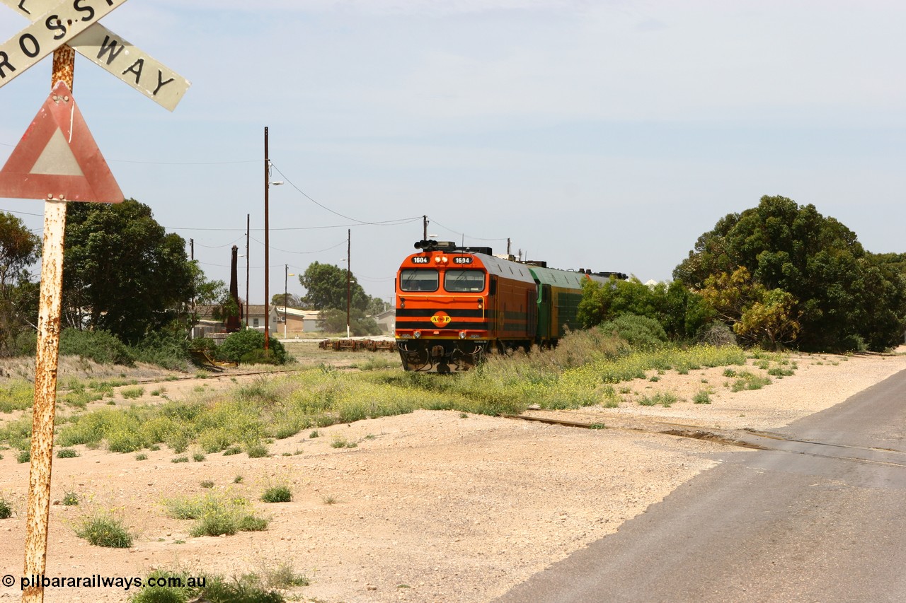 060113 2560
Thevenard, loaded gypsum train 6DD4 snakes into the yard behind 1600 class unit 1604 in Australian Railroad Group livery a Clyde Engineering built EMD JL22C model serial 71-731, originally built as NJ class NJ 4. [url=https://goo.gl/maps/9g3QoE4iaiDjqyta9]Bergmann Dr grade crossing[/url]. 13th January 2006.
Keywords: 1600-class;1604;Clyde-Engineering-Granville-NSW;EMD;JL22C;71-731;NJ-class;NJ4;