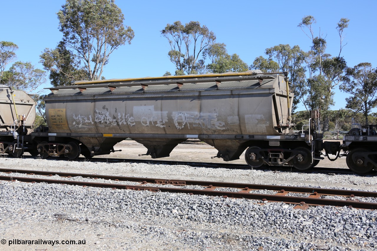 130703 0201
Tooligie, HCN type bogie grain hopper waggon HCN 36, originally an NHB type hopper built by Tulloch Ltd for the Commonwealth Railways North Australia Railway. One of forty rebuilt by Islington Workshops 1978-79 to the HCN type with a 36 ton rating, increased to 40 tonnes in 1984. Seen here loaded with grain with a Moose Metalworks roll-top cover.
Keywords: HCN-type;HCN36;SAR-Islington-WS;rebuild;Tulloch-Ltd-NSW;NHB-type;NHB1592;