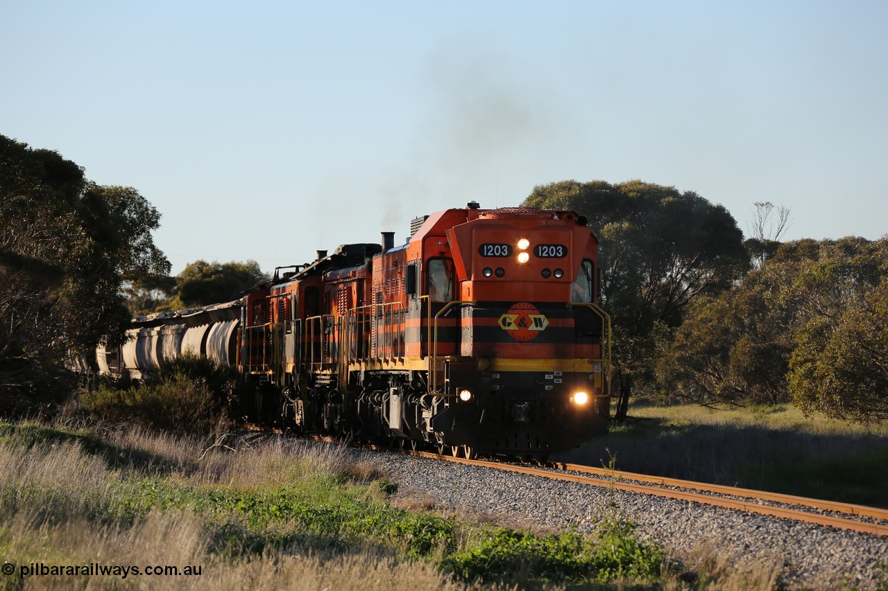 130703 0248
Kaldow, running south with the sun behind it is 1200 class 1204 a Clyde Engineering built EMD G12C model with serial 65-428 leading two ALCo units and was originally built in 1965 for Western Mining Corporation and operated by the WAGR as their A class A 1513. It came to the Eyre Peninsula in October 2004. [url=https://goo.gl/maps/FnDpXh45LbN7scrt5]Geo location[/url]. 3rd July 2013.
Keywords: 1200-class;1203;Clyde-Engineering-Granville-NSW;EMD;G12C;65-427;A-class;A1513;