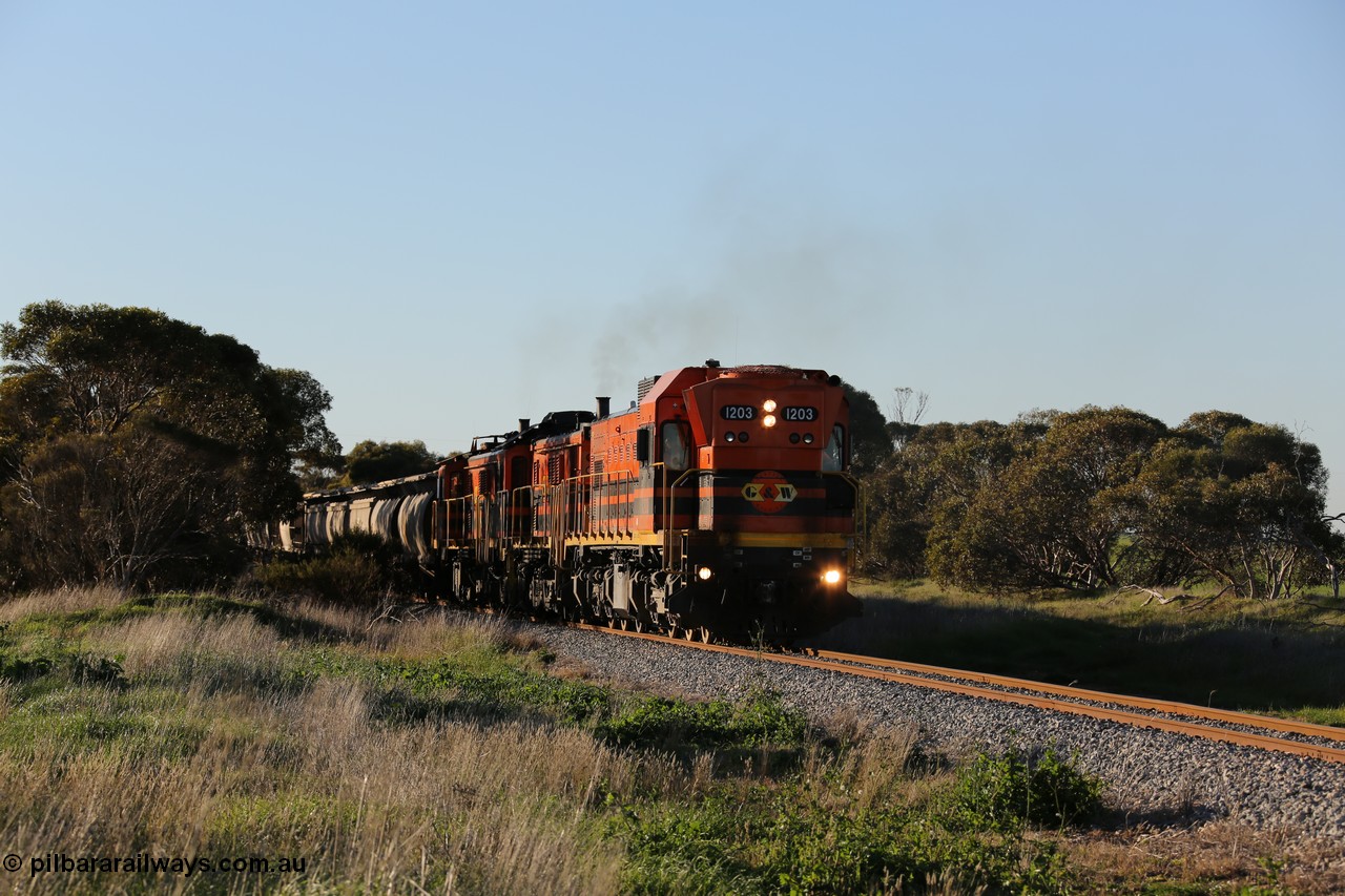 130703 0249
Kaldow, running south with the sun behind it is 1200 class 1204 a Clyde Engineering built EMD G12C model with serial 65-428 leading two ALCo units and was originally built in 1965 for Western Mining Corporation and operated by the WAGR as their A class A 1513. It came to the Eyre Peninsula in October 2004. [url=https://goo.gl/maps/FnDpXh45LbN7scrt5]Geo location[/url]. 3rd July 2013.
Keywords: 1200-class;1203;Clyde-Engineering-Granville-NSW;EMD;G12C;65-427;A-class;A1513;