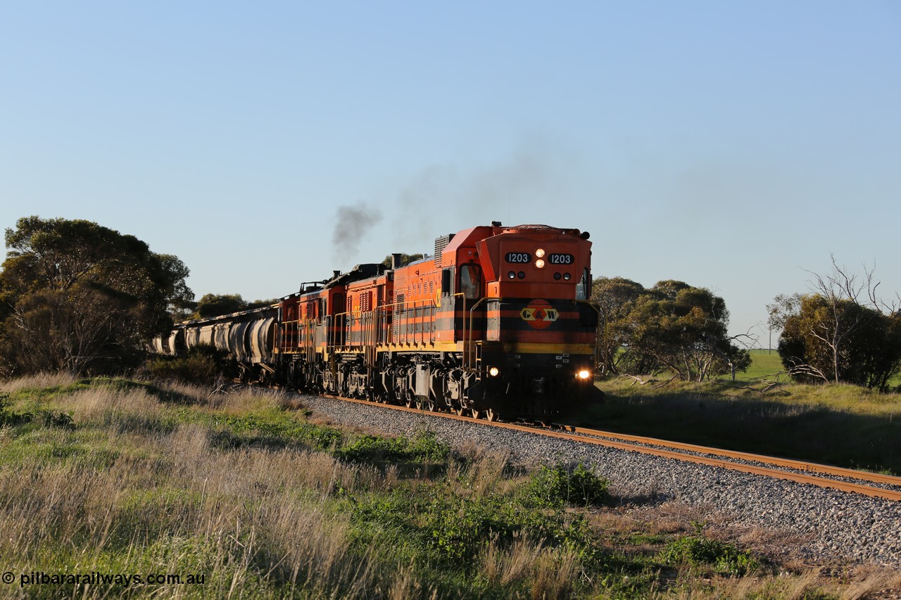 130703 0251
Kaldow, running south with the sun behind it is 1200 class 1204 a Clyde Engineering built EMD G12C model with serial 65-428 leading two ALCo units and was originally built in 1965 for Western Mining Corporation and operated by the WAGR as their A class A 1513. It came to the Eyre Peninsula in October 2004. [url=https://goo.gl/maps/FnDpXh45LbN7scrt5]Geo location[/url]. 3rd July 2013.
Keywords: 1200-class;1203;Clyde-Engineering-Granville-NSW;EMD;G12C;65-427;A-class;A1513;